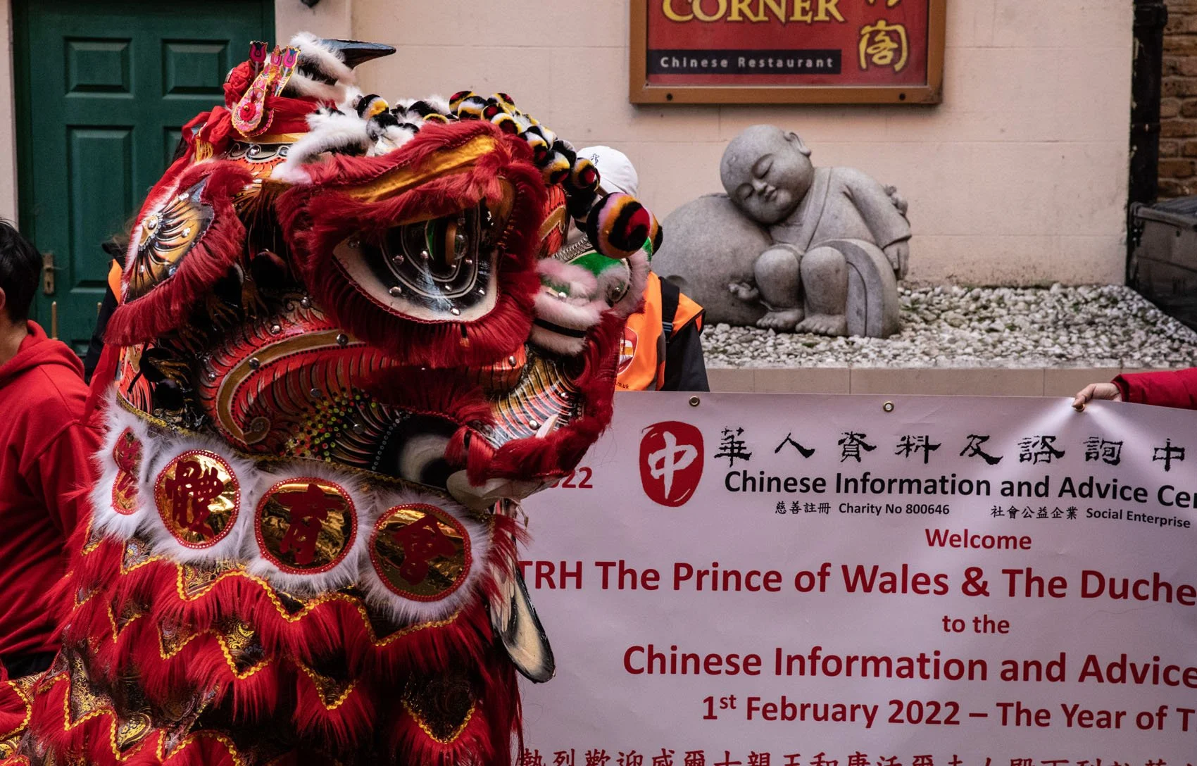 Dancing dragon and banner in London's Chinatown for Chinese New Year