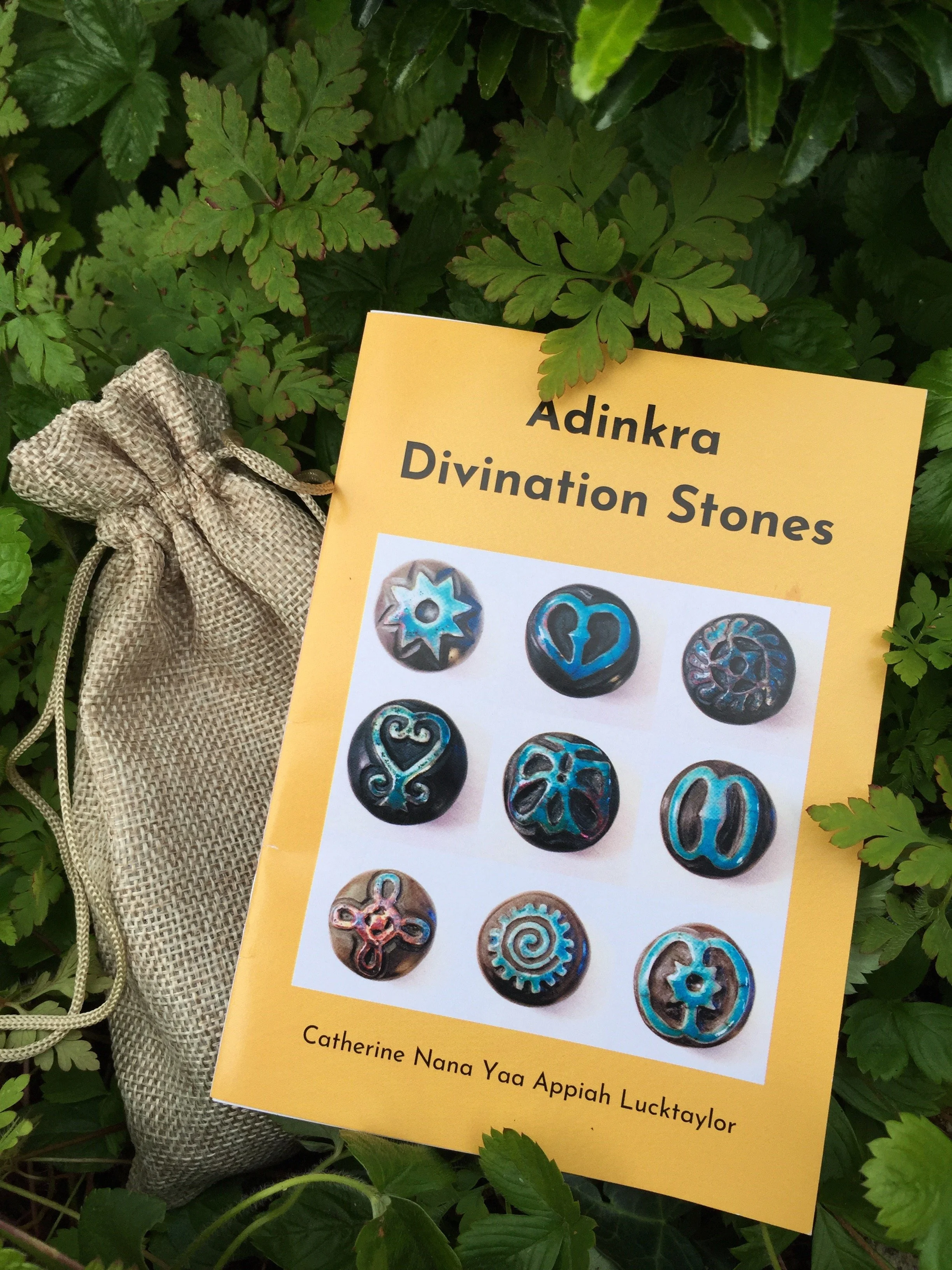 Booklet and Adinkra stones in bag_Lucktaylor Ceramics.JPG