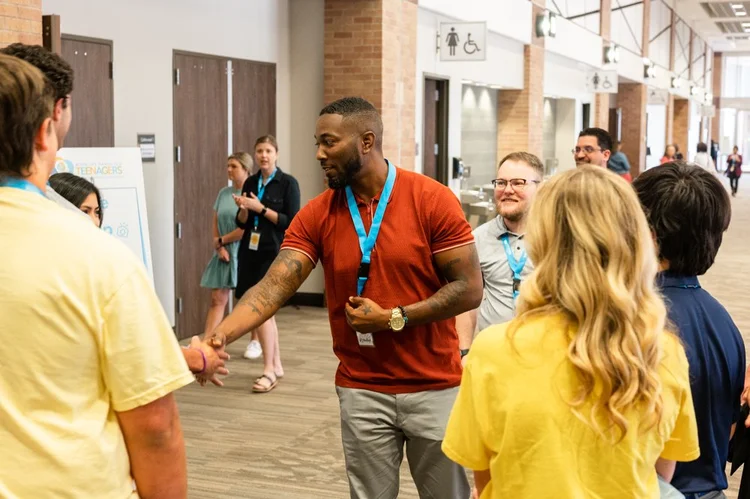 Conference attendees connect during a break