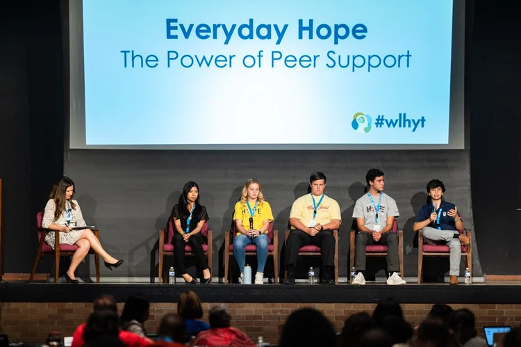 Teen panelists share their perspectives on stage