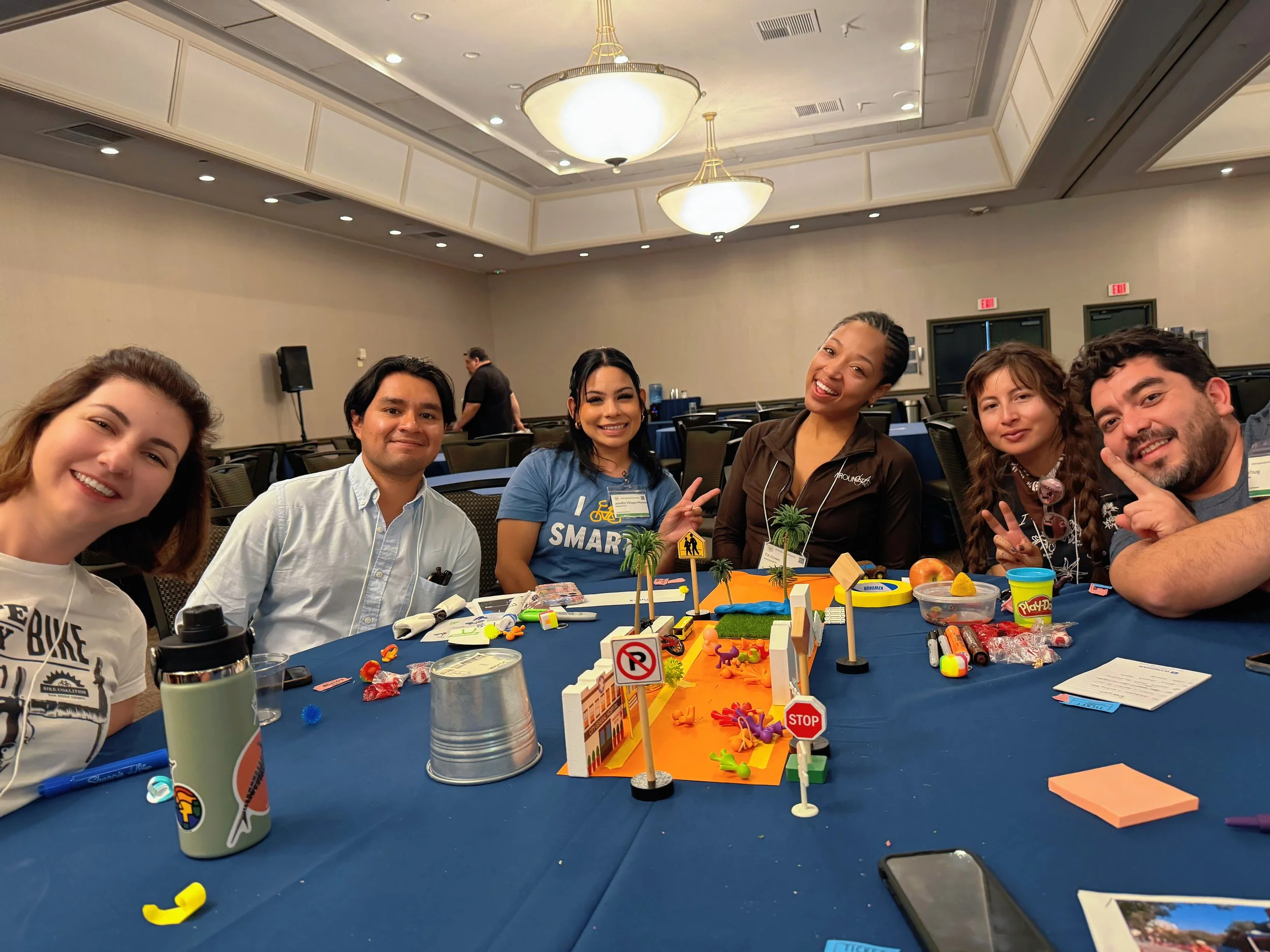 Attendees of California Bicycle Summit participate in a group activity during a breakout session about building better streets for all.