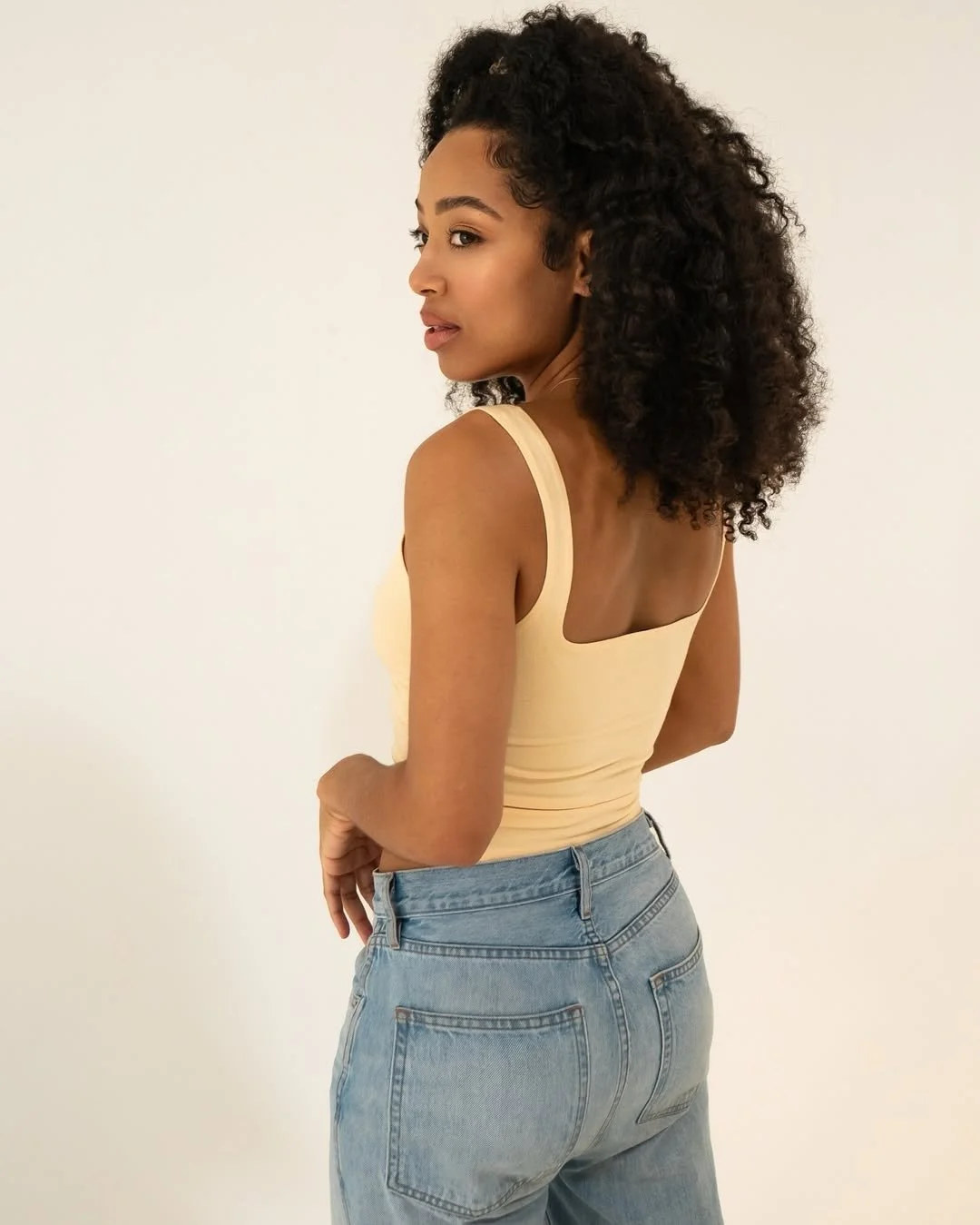 portrait of T. Krystal Greaux, most commonly known as TK, writer and creator of AROUNDwithTK