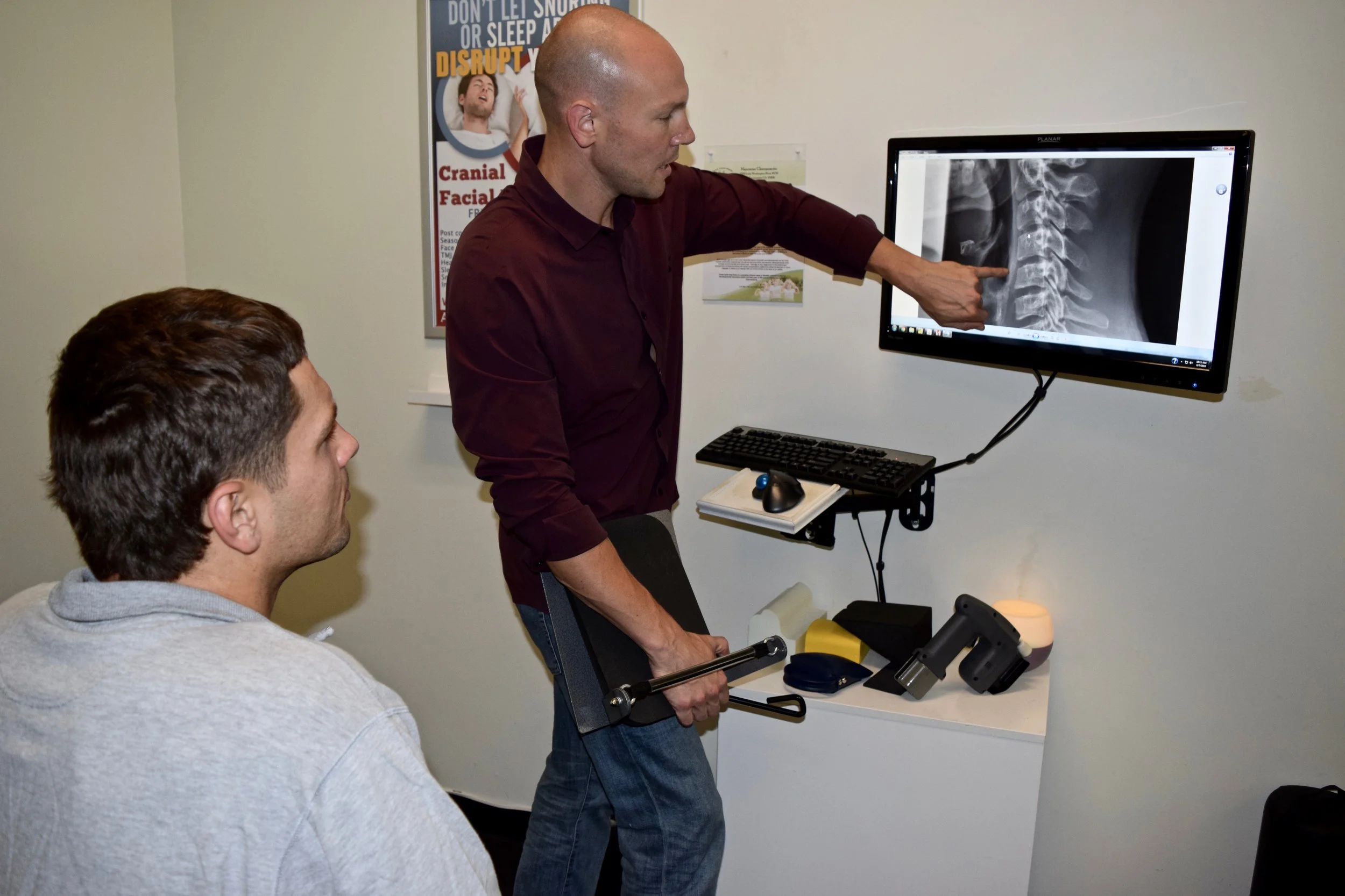 Max Chiro Dr Tim Examine XRay w Patient .jpg