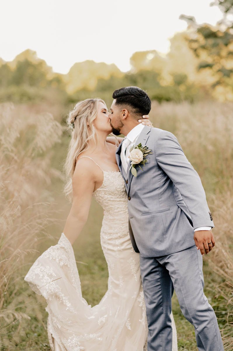 Bride-Groom-Kissing-The-Maples-Estate.jpg