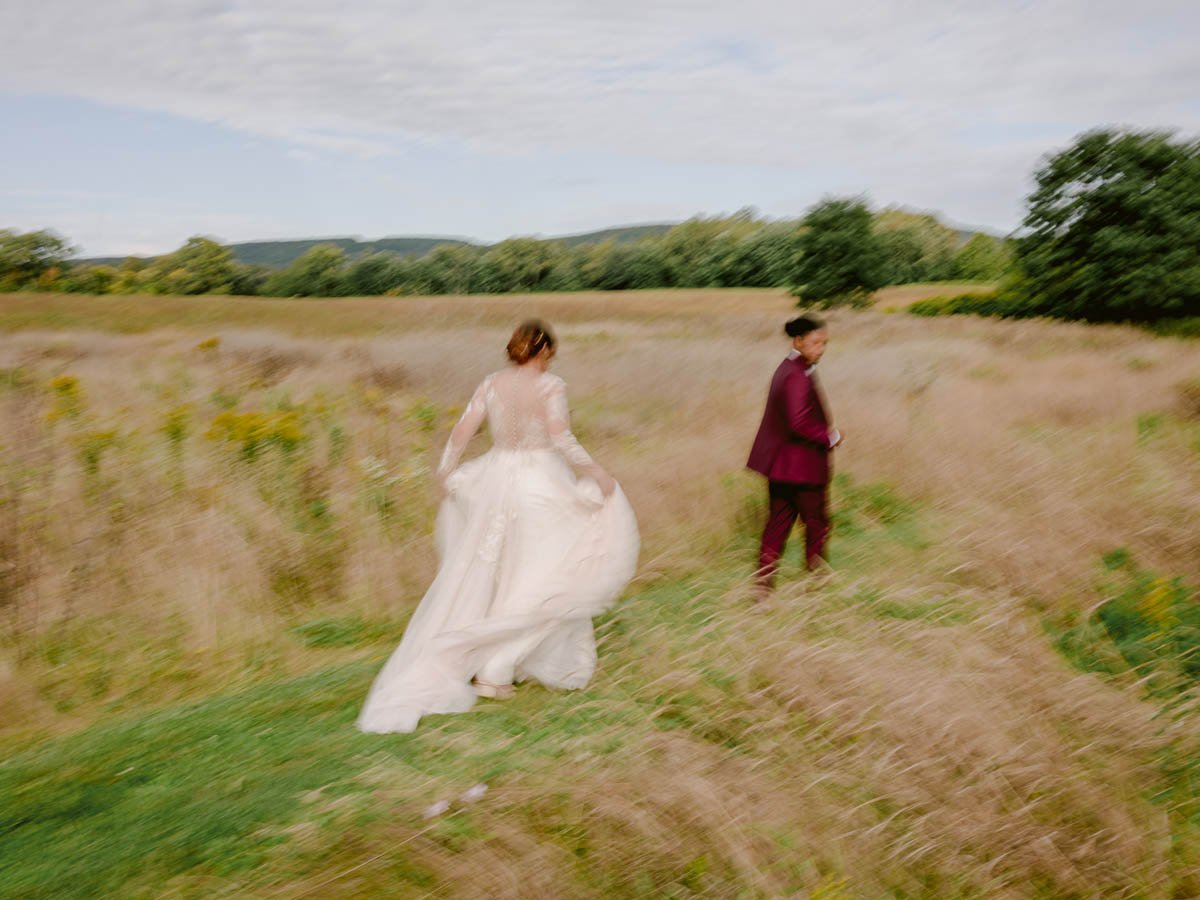 Bride-Groom-Running-Field-Upstate-New-York.jpg