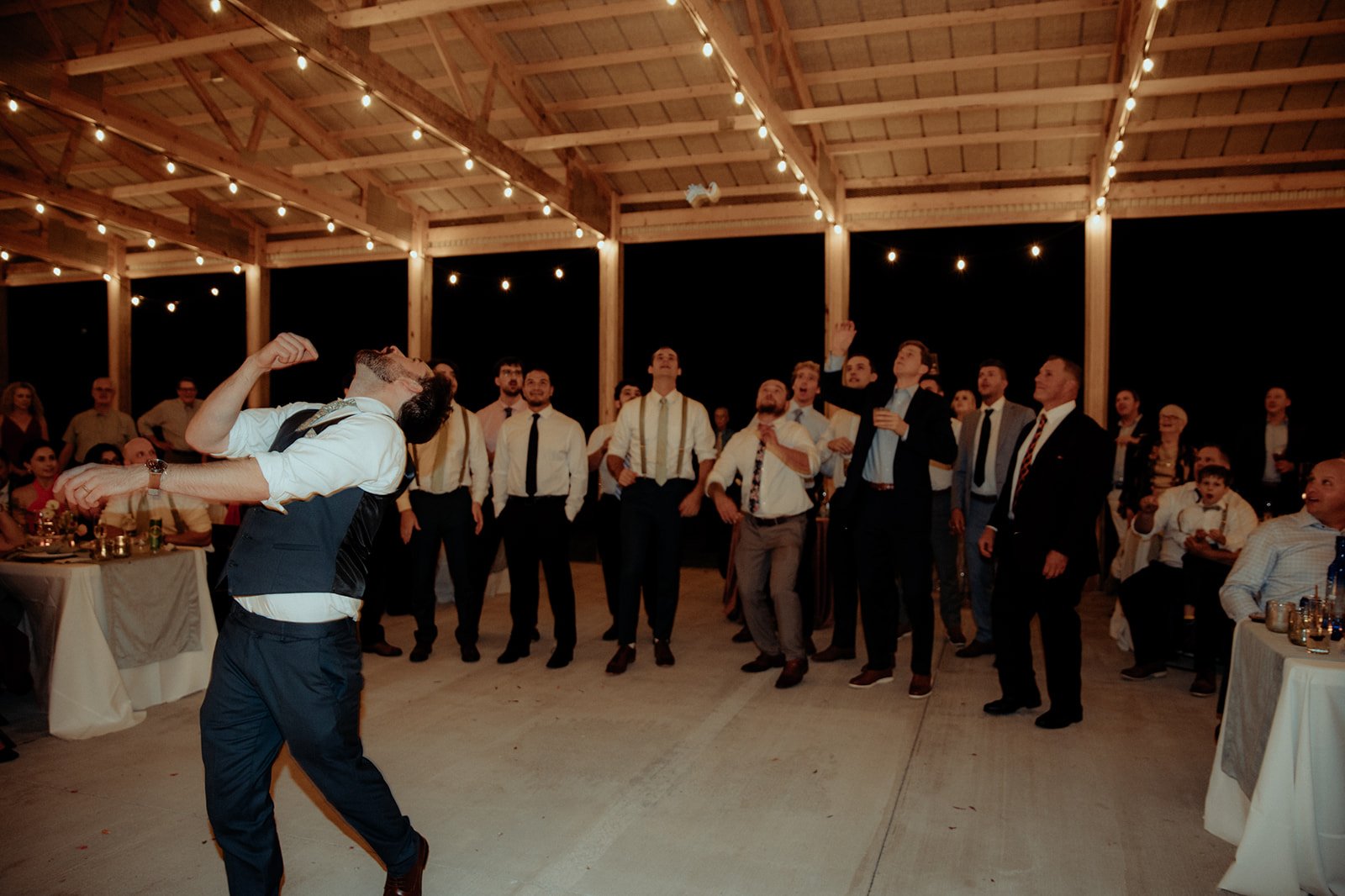 Romantic_Upstate_NY_Wedding_116_garter_toss.jpg