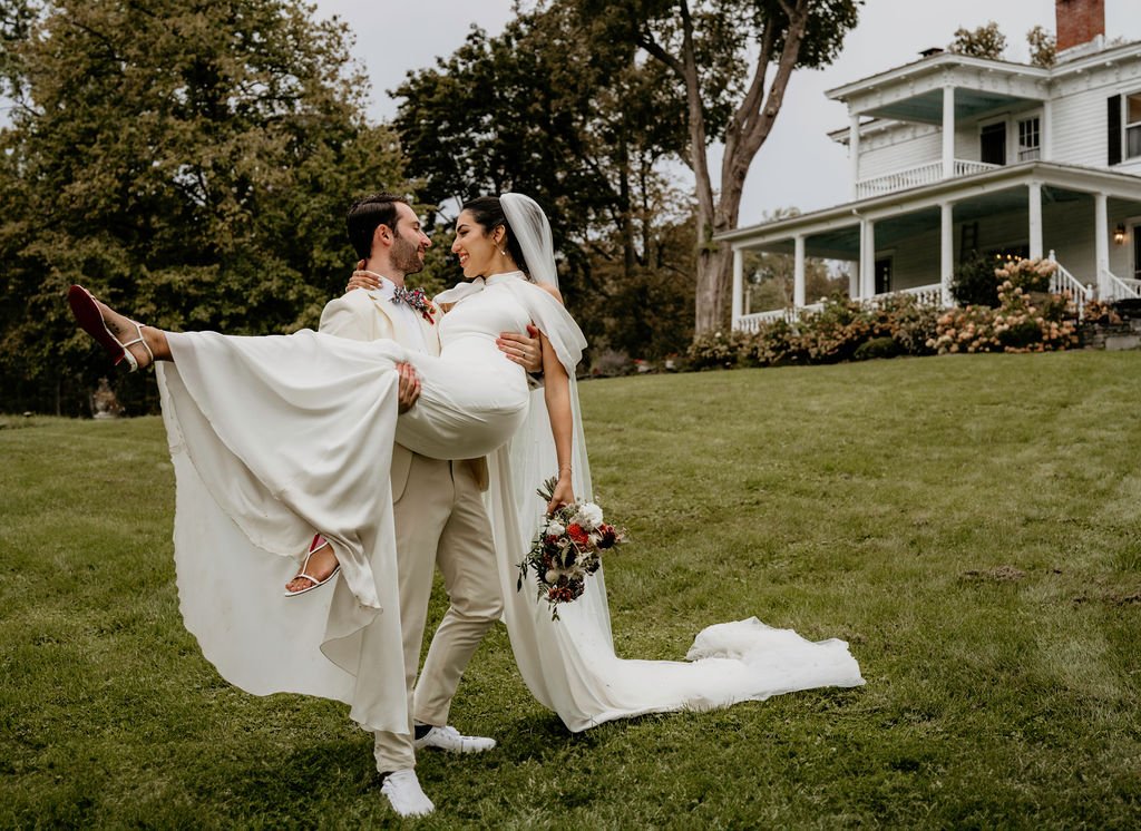 Chill_Wedding_Upstate_NY_72_bride_groom_carry.jpg