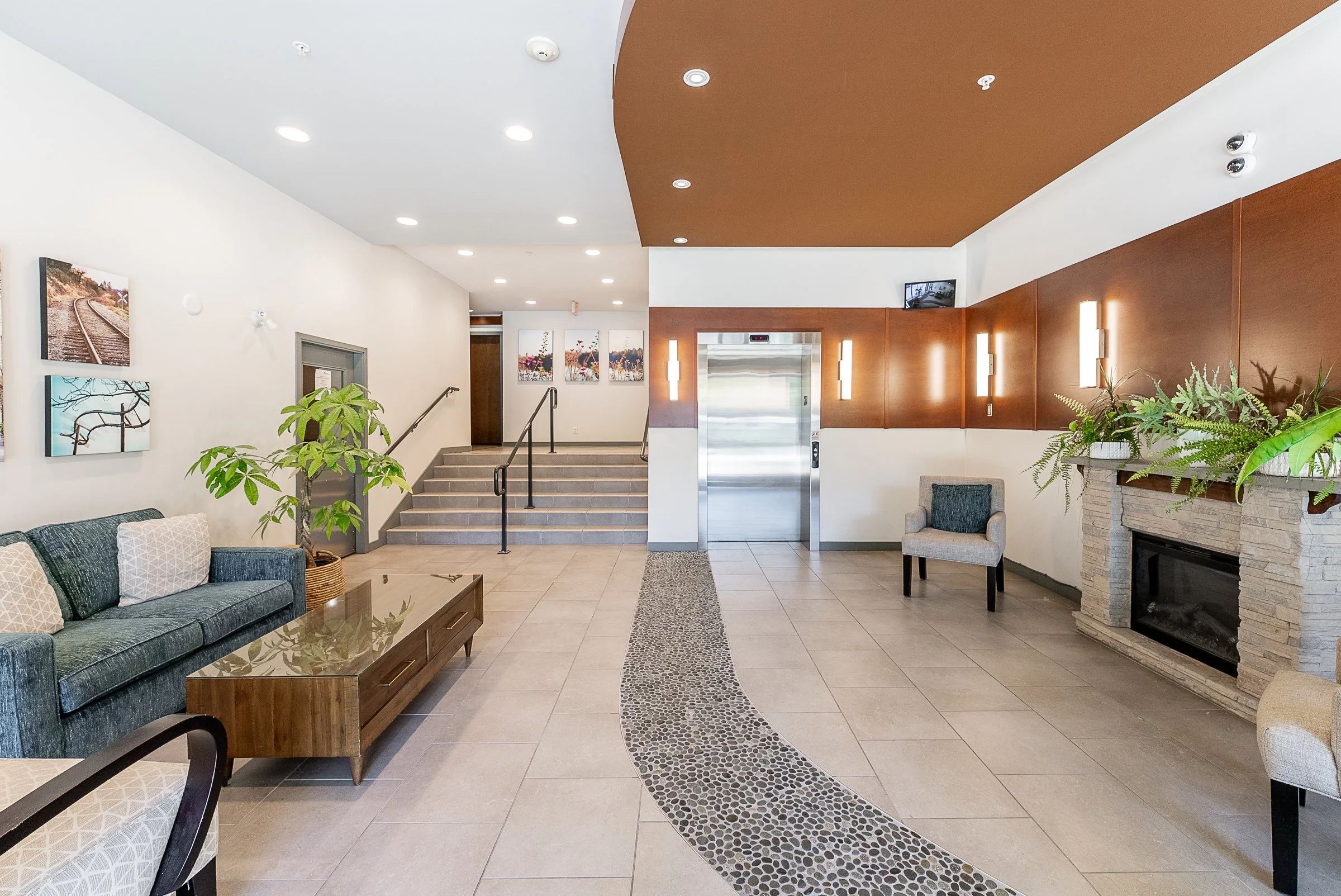 320-101-Morrissey-Road-Suter-Brook-Village-Condo-Carolyn-Pogue-Best-Port-Moody-Realtor-1.jpg