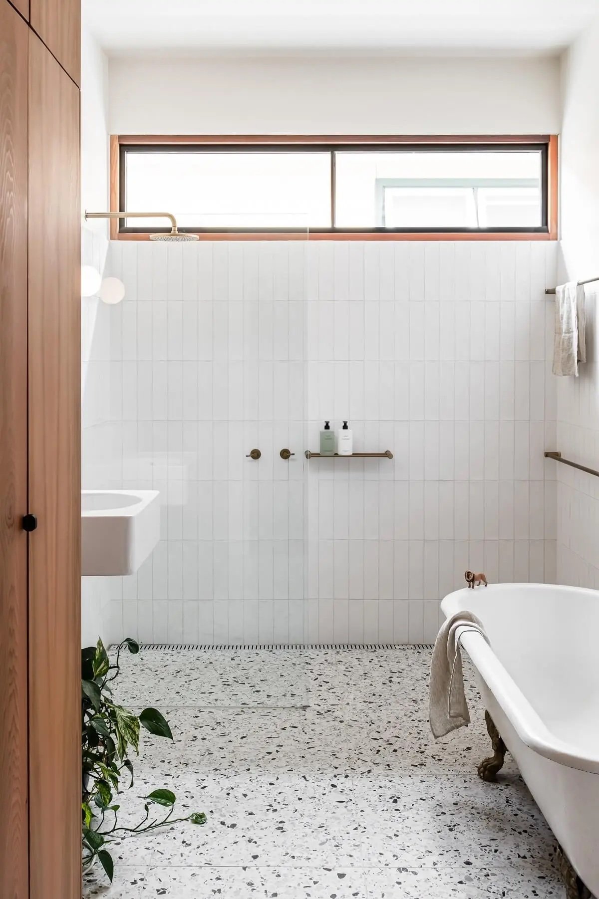 vertical-wall-tiles-small-light-bathroom-nordroom.jpeg