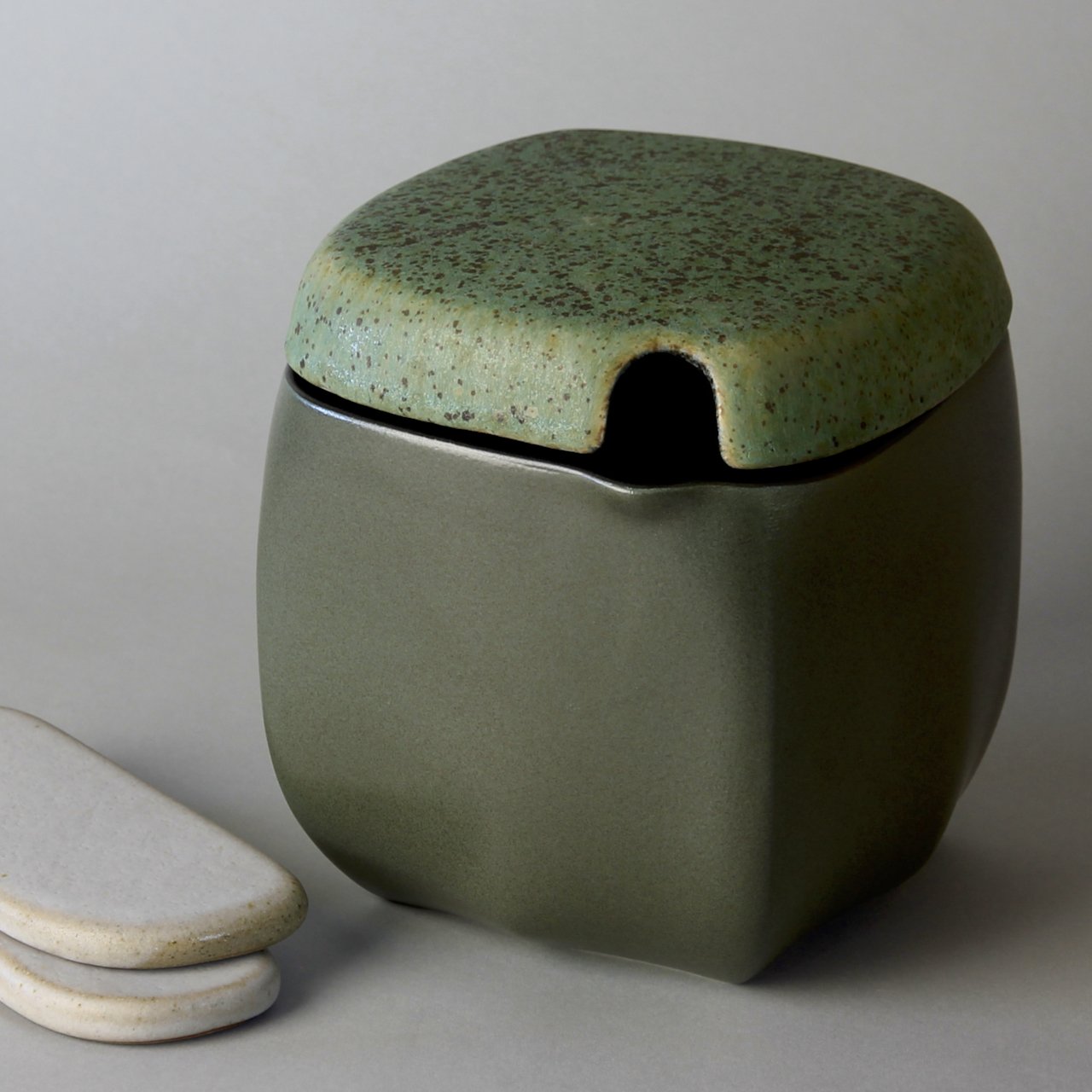fermenting crock green w river rock lid.jpeg