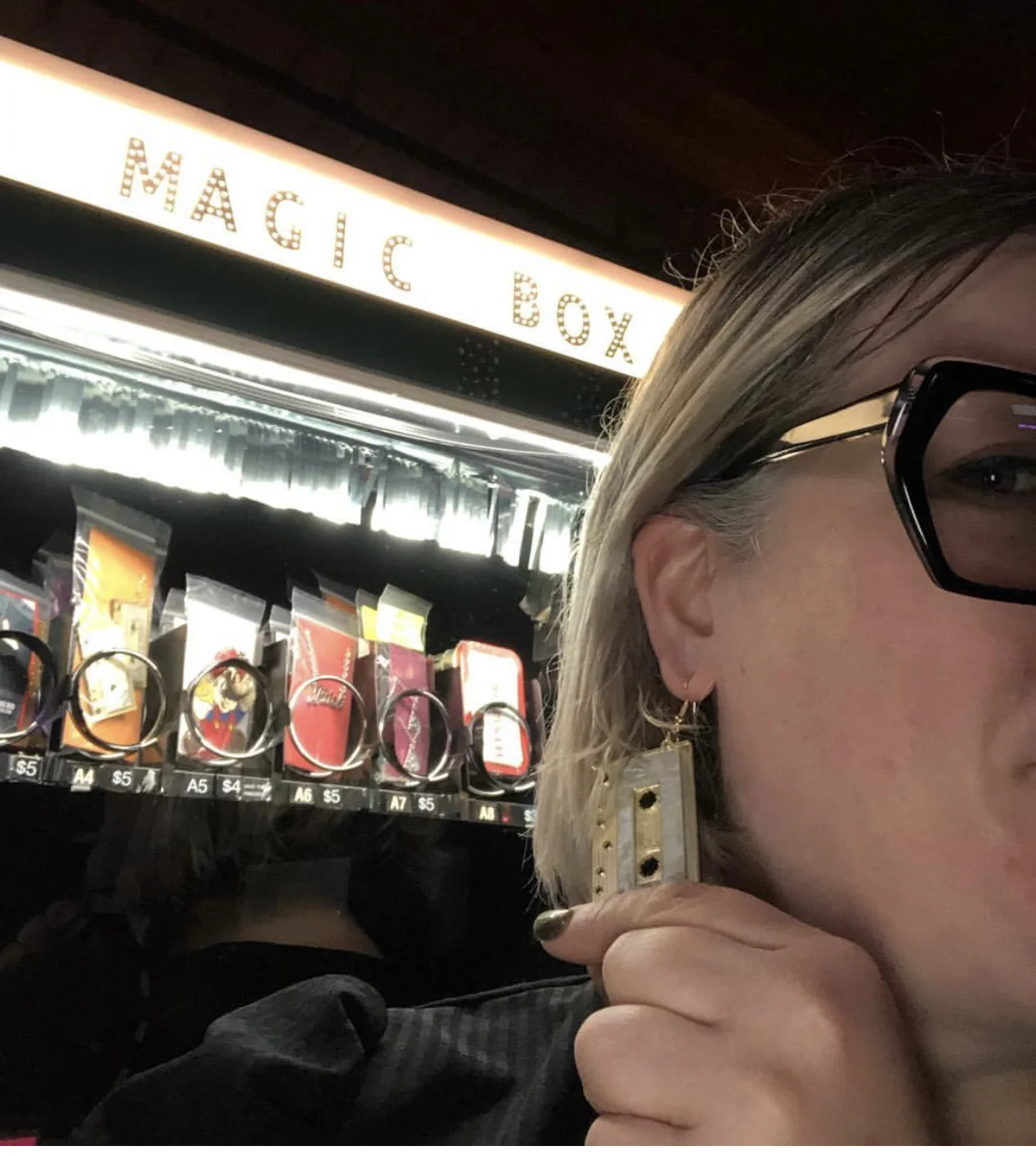 Cari Carter: Owner, Founder, Magician, Jewelry Model.