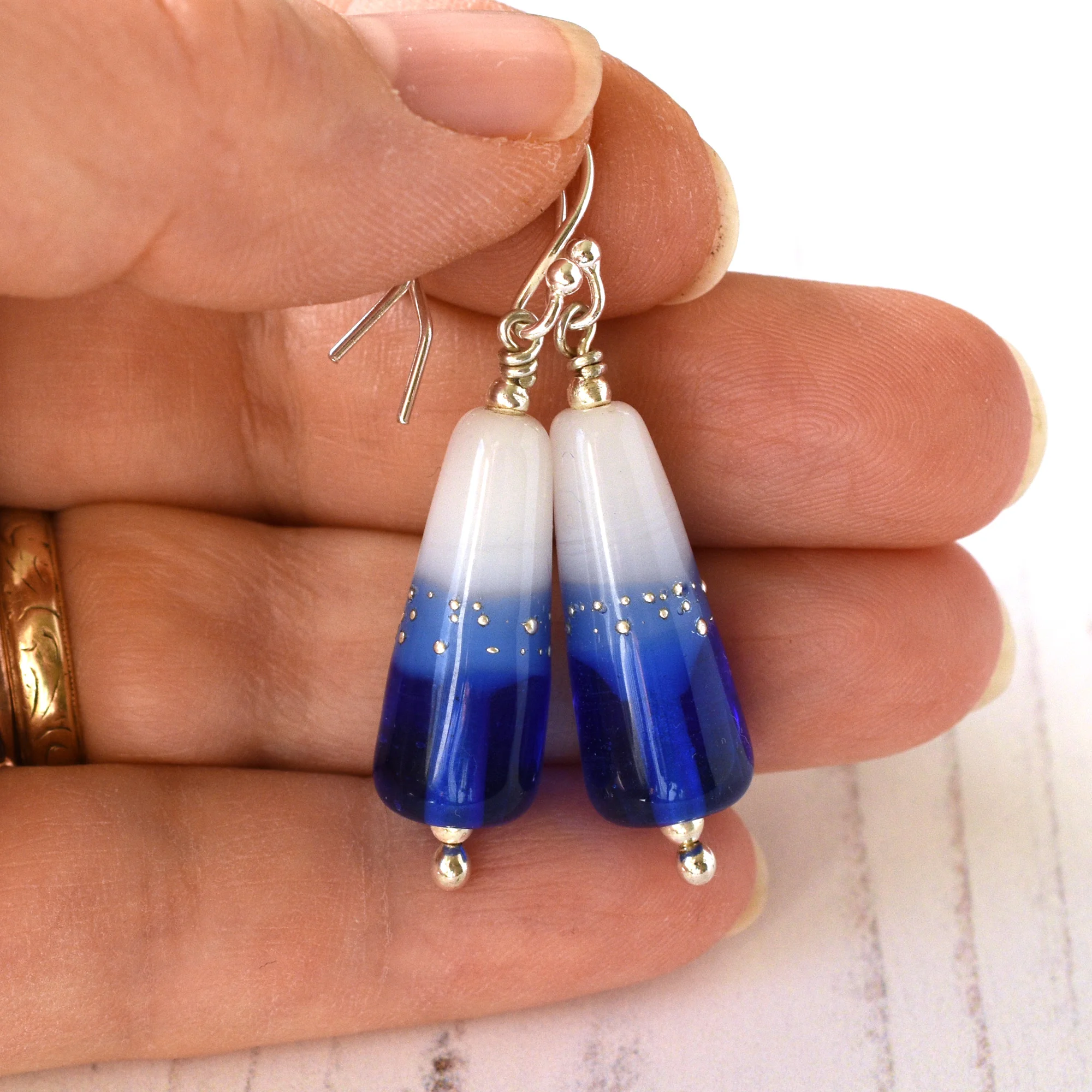 blue-white-drop-earrings-1204-in-hand.jpg