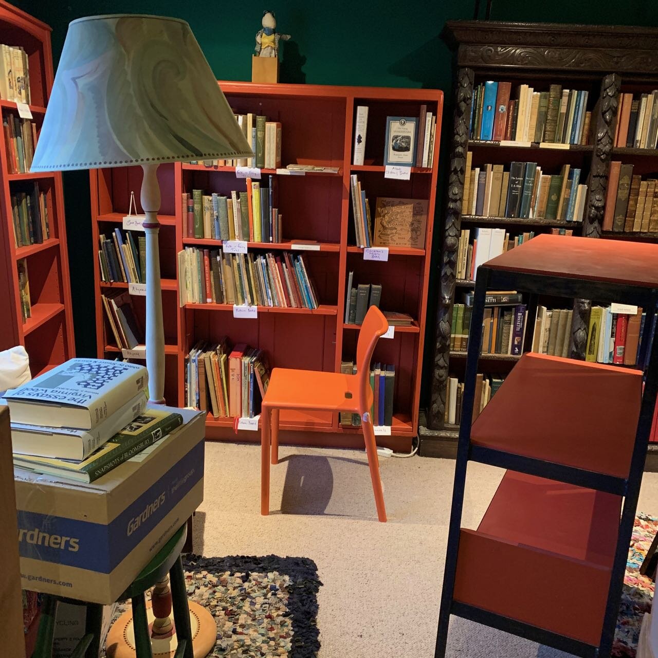 Lit room with orange chair.jpg