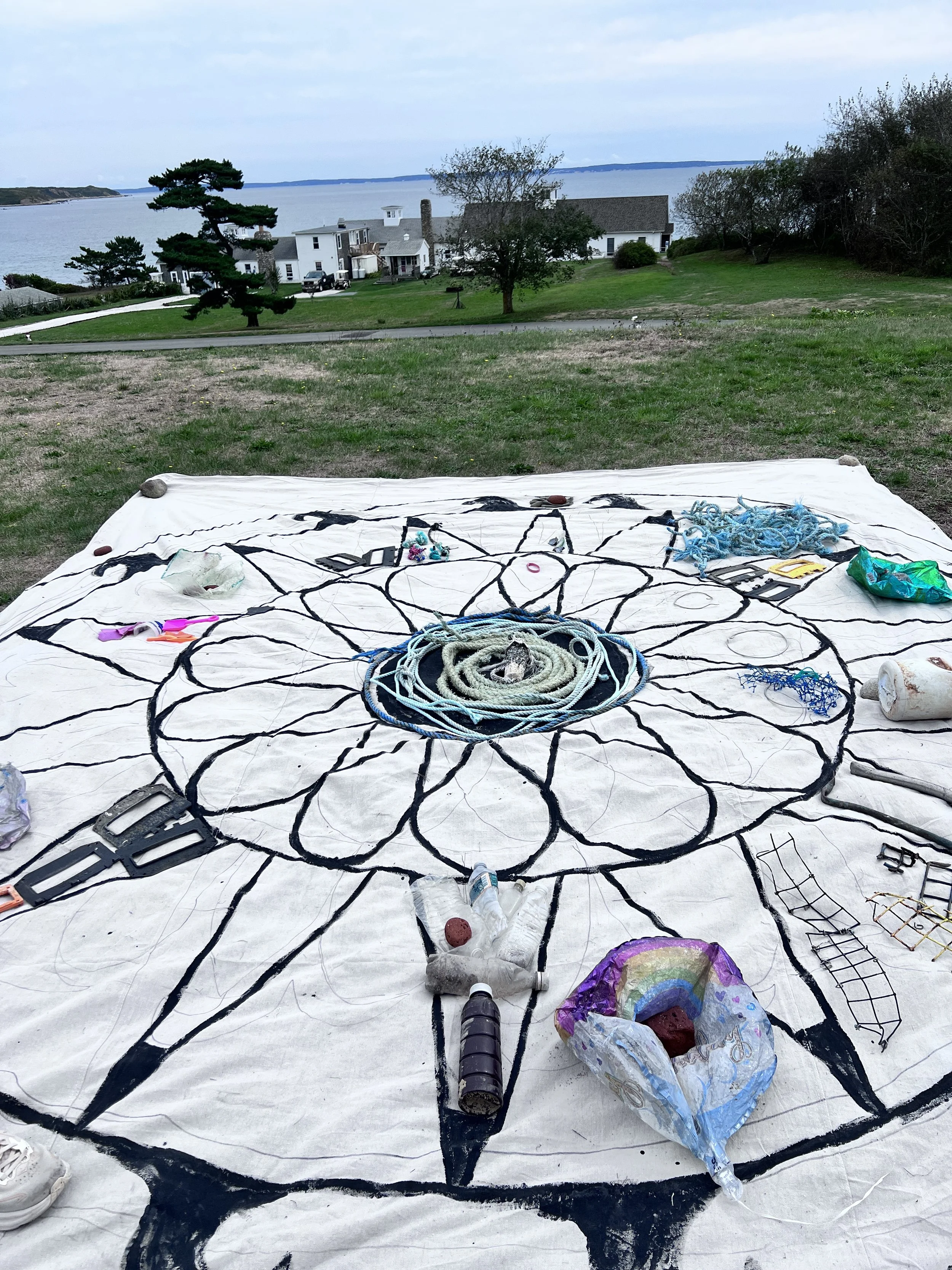  Participants organized the collected trash onto the shapes in the Mandala.