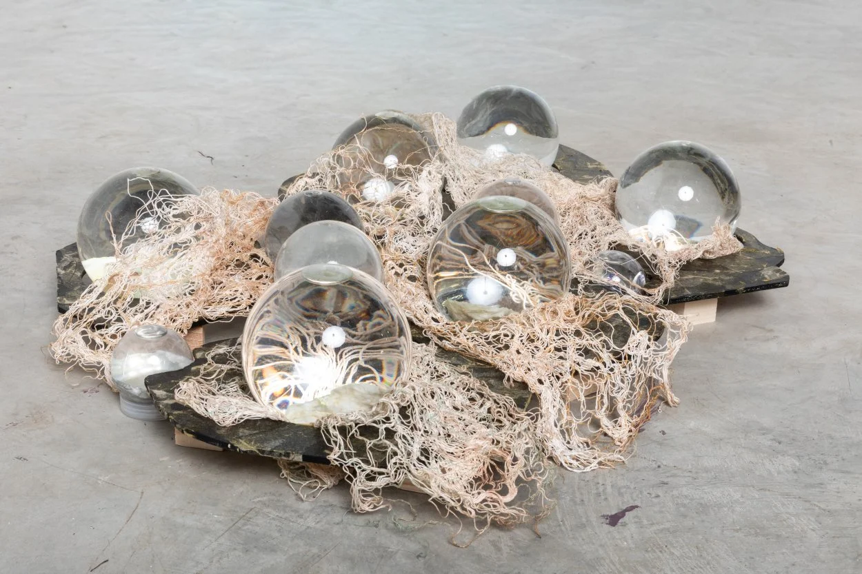 "Bio-Valve" , wood, cotton thread, plastic water filled globes, oyster shells, 40x22x8" varies with installation