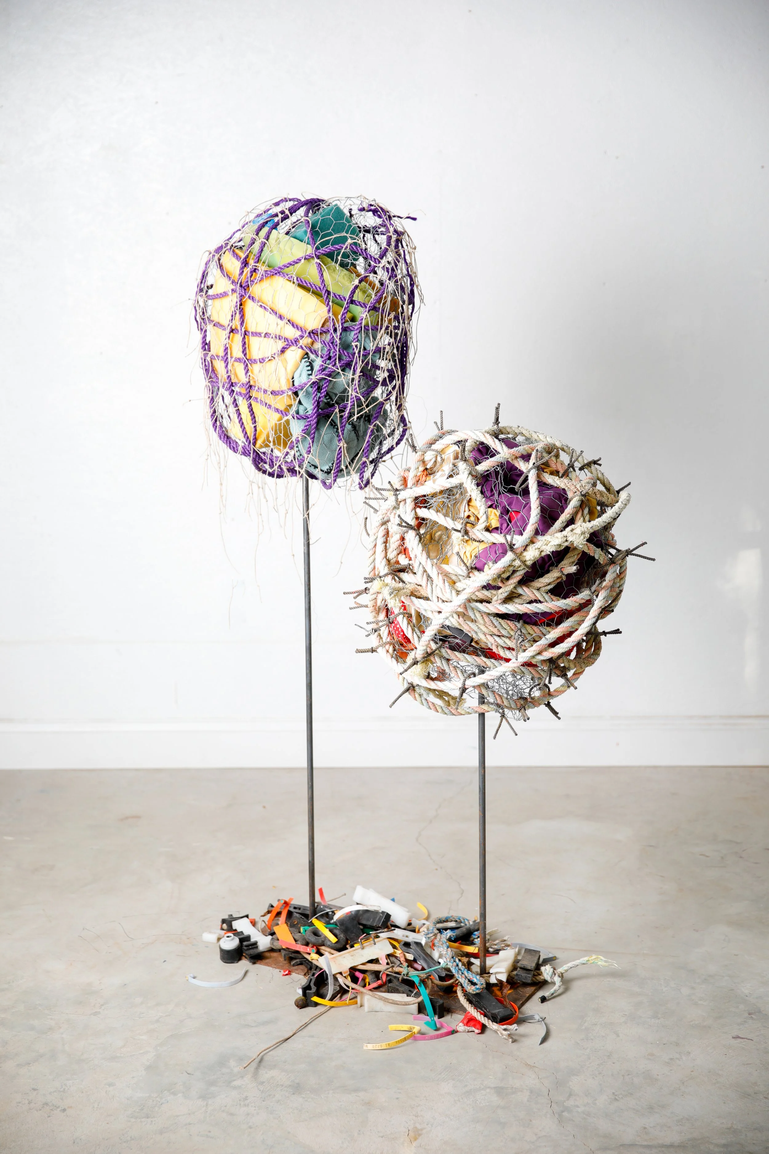 Terra Incognita, 2026, collected marine debris, hog rings, cotton thread, steel, 60x36x16”