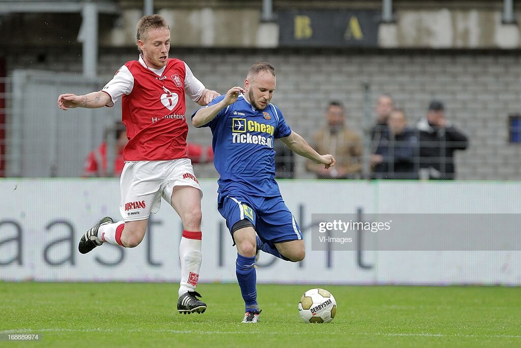  (L-R) Nathan Rutjes of MVV Maastricht, Nick Coster of FC Volendam during the Promotion / relegation match between MVV and  FC Volendam at De Geusselt on May 16 , 2013 in Maastricht, The Netherlands.(Photo by VI Images via Getty Images) 