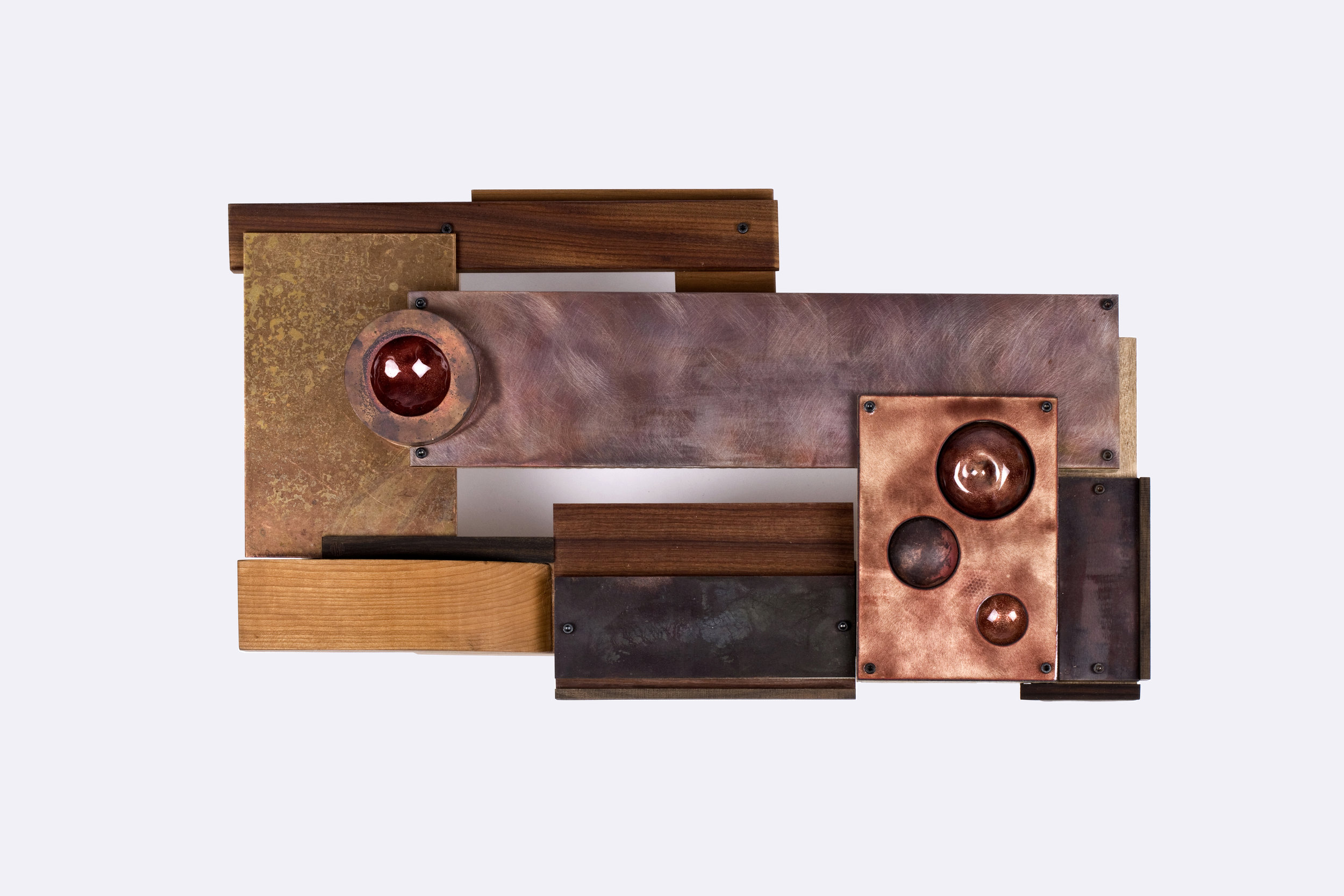   Med eller mot |  Wall sculpture, 2018 | 25x46x8cm | Materials: Wood, copper, brass, steel, enamel.  Photo credit: Aliona Pazdniakova   