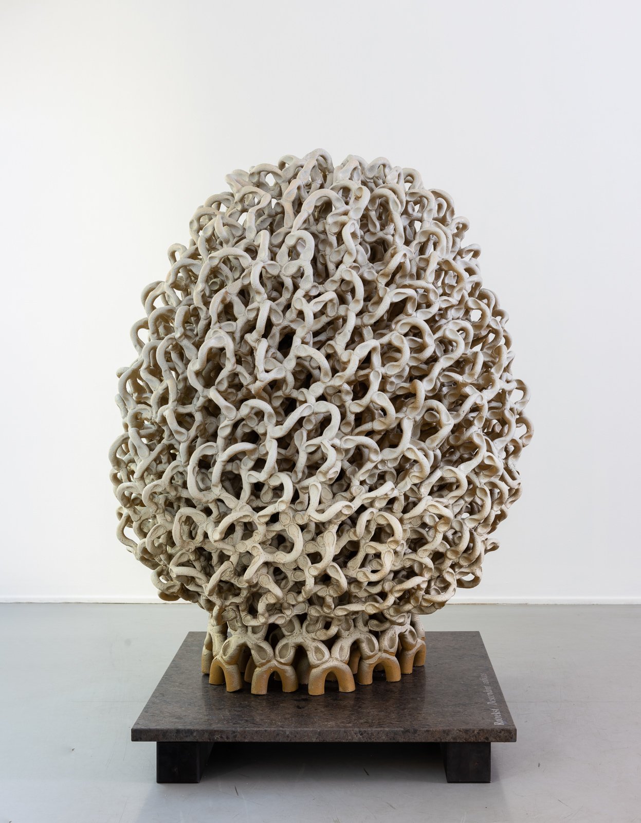  Rotvekst / Root Crop /  Descendunt radices   2021, Modeled in stoneware, airbrushed with porcelain slip and brushed with ceramic glazes. Base in granite and treated wood.  Photo: Thomas Tveter 