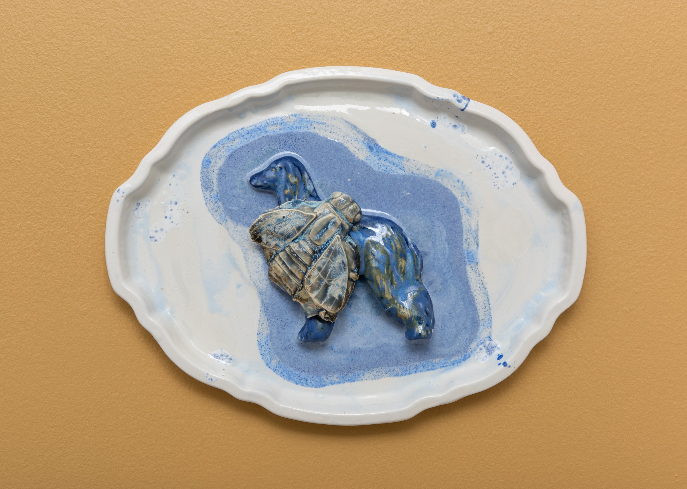  Why do Europeans put plates on their walls? I | 2022  Porcelain, glazes, porcelain decals and tissue paper, press molding. 39x30x5  Photo: Thomas Tveter 