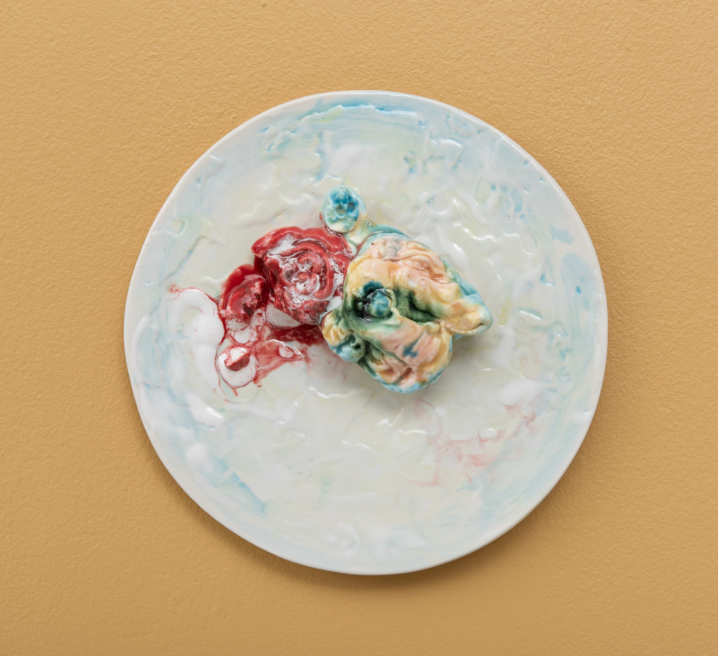  Why do Europeans put plates on their walls? II | 2022  Porcelain, glazes, porcelain decals and tissue paper, press molding. 27x27x7cm  Photo: Thomas Tveter 