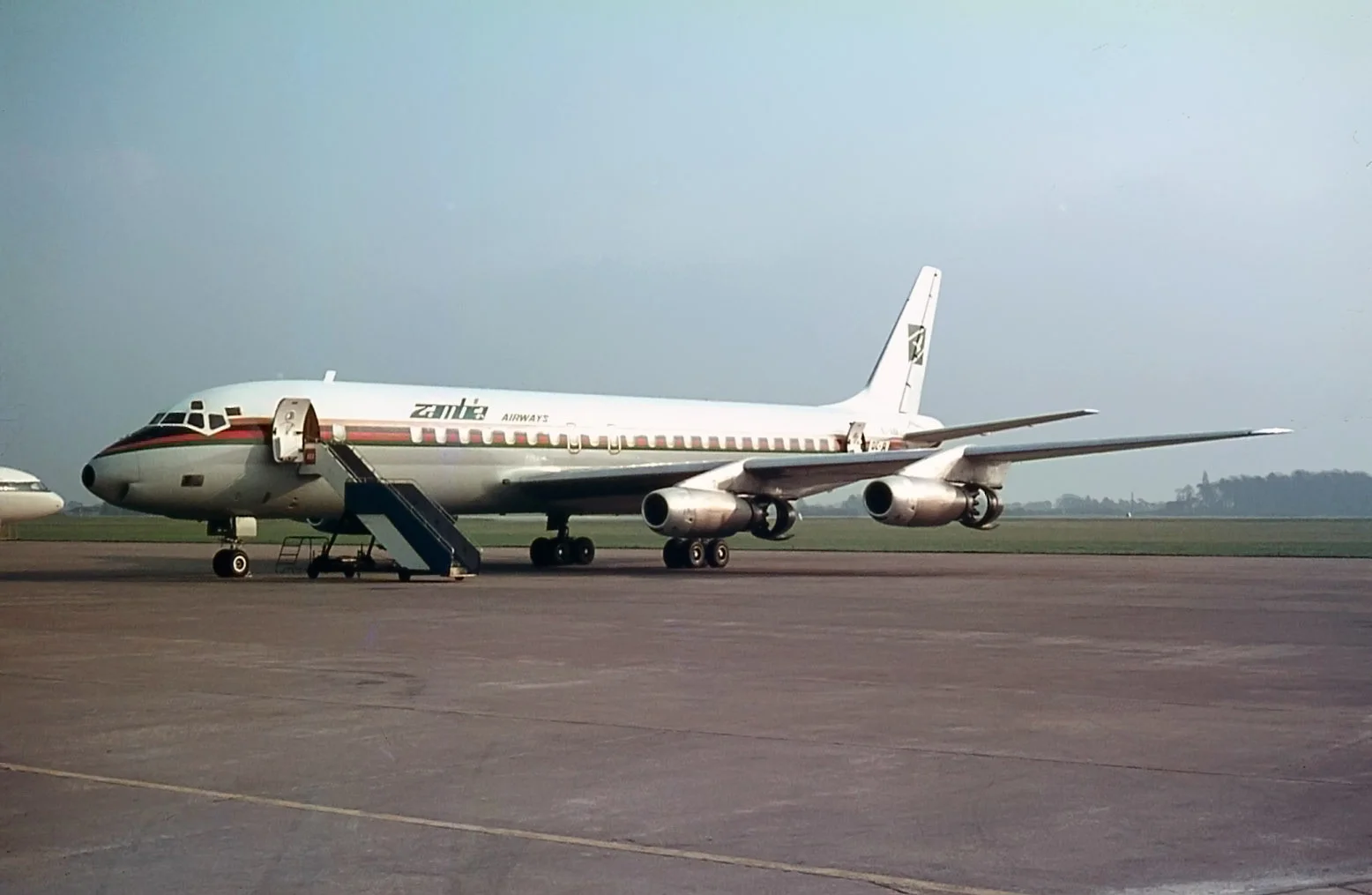 Zambia Airways Dc8-43 9J-ABR is seen parked in the South bay on 21st March 1974. Photo Peter Hampson.