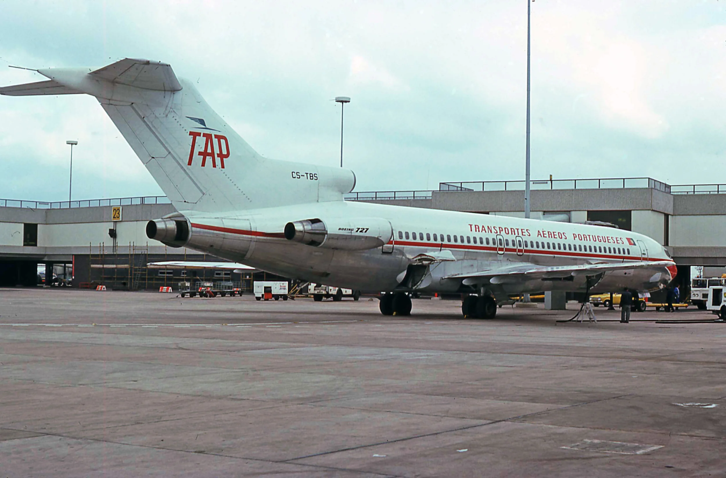TAP Boeing 727-200 CS-TBS is seen here on Stand 21 Pier C in April 1976. Photo Peter H