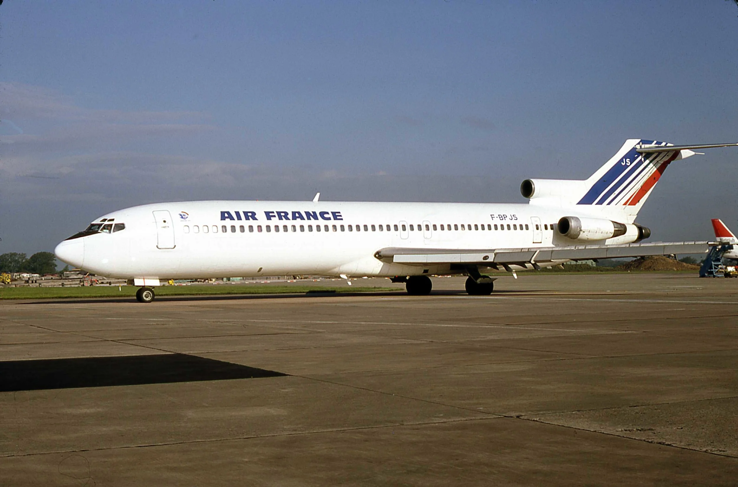 Air France B727-200 F-BPJS is on the move along the West side of Pier B for the morning departure to Paris in May 1981. Photo; Peter H
