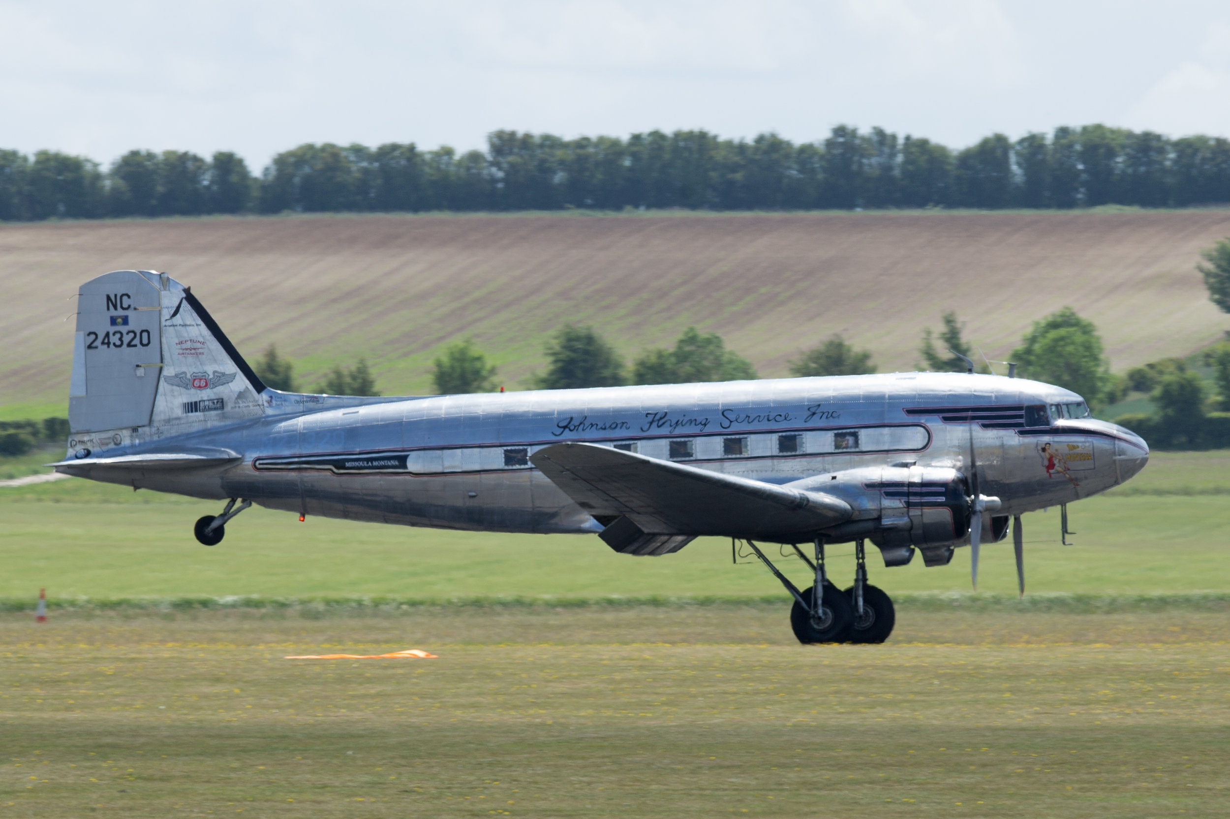 NC24320 Miss Montana landing at Duxford 3rd June 2019; Peter Hampson