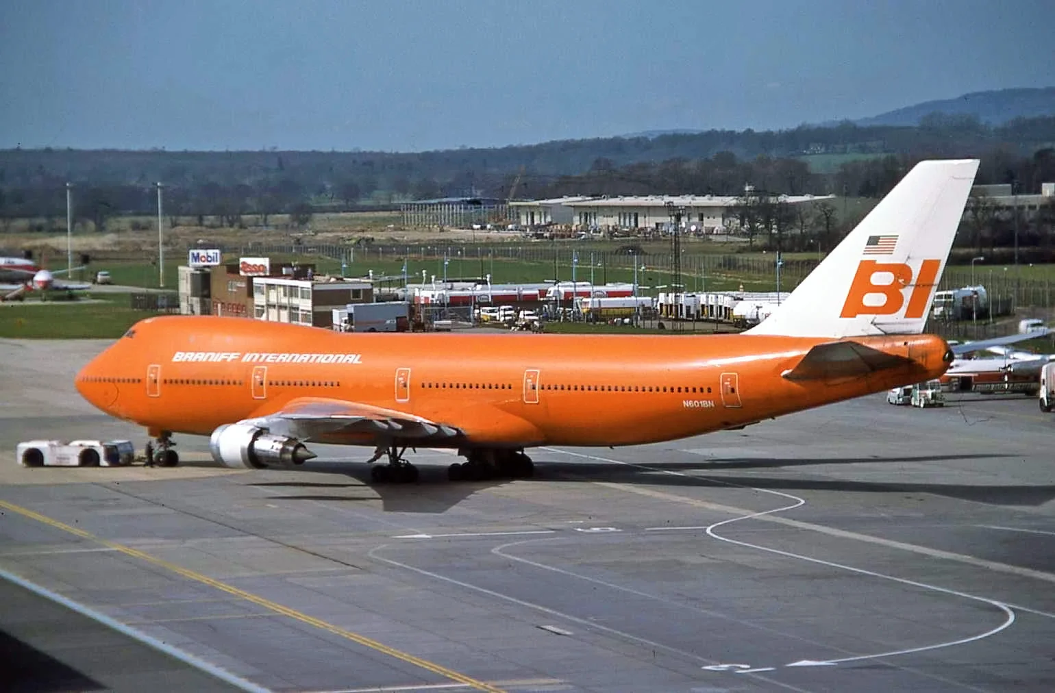 Taken from the old Spectator Terrace - The “Big Orange”, Braniff B747 N601BN at Gatwick in April 1978