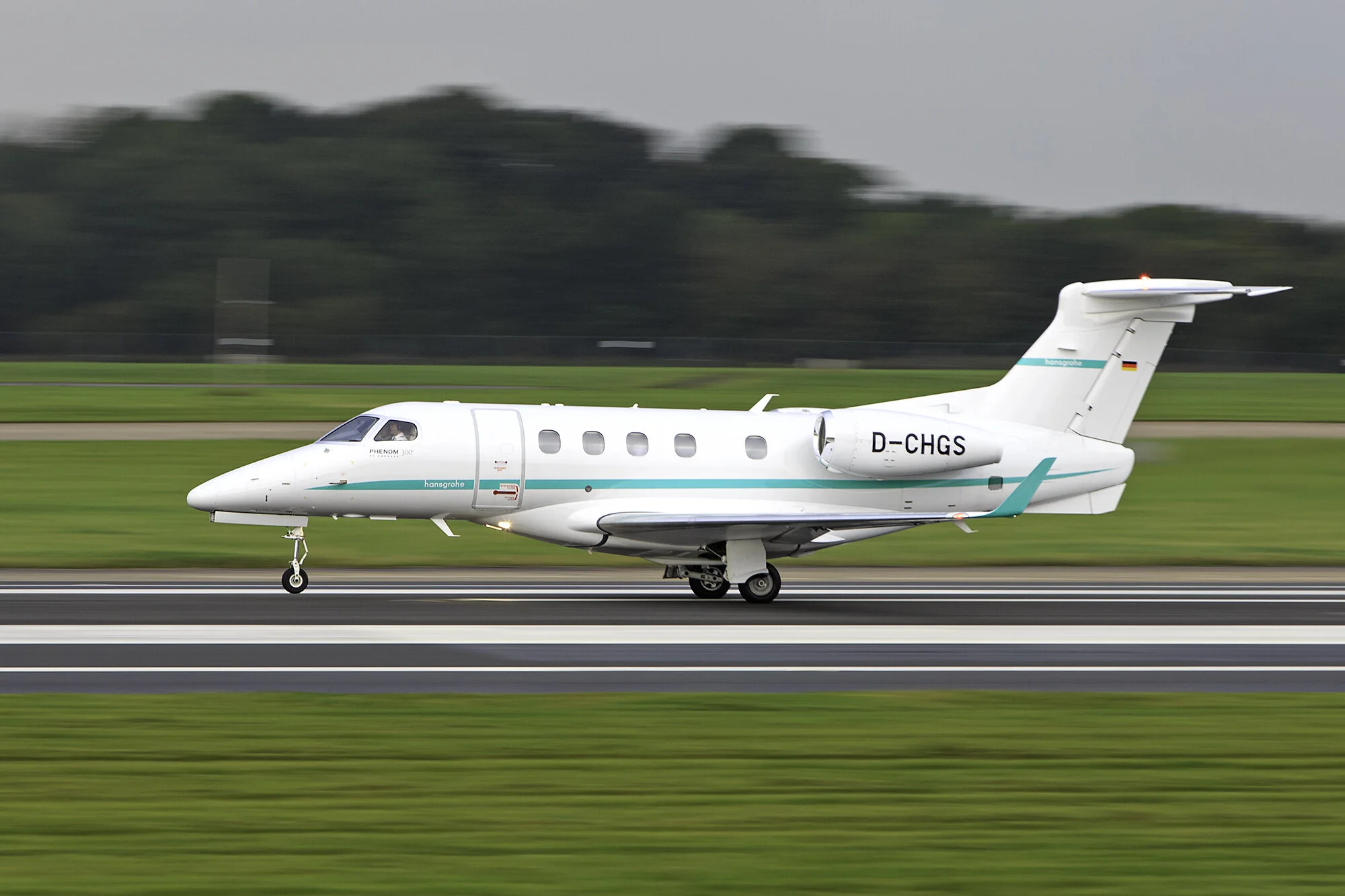 Embraer Phenom 300 D-CHGS departing on Runway 23 Left. 25th September 2019. Photo: Paul Bailey