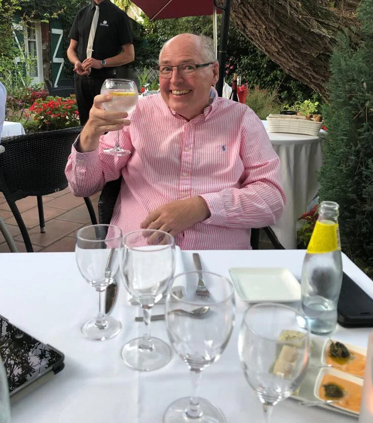 Aaah Bonjour!..TAS Chairman Peter Hampson is pictured partaking in a swift G&T before tucking into a pair of…. snails!!