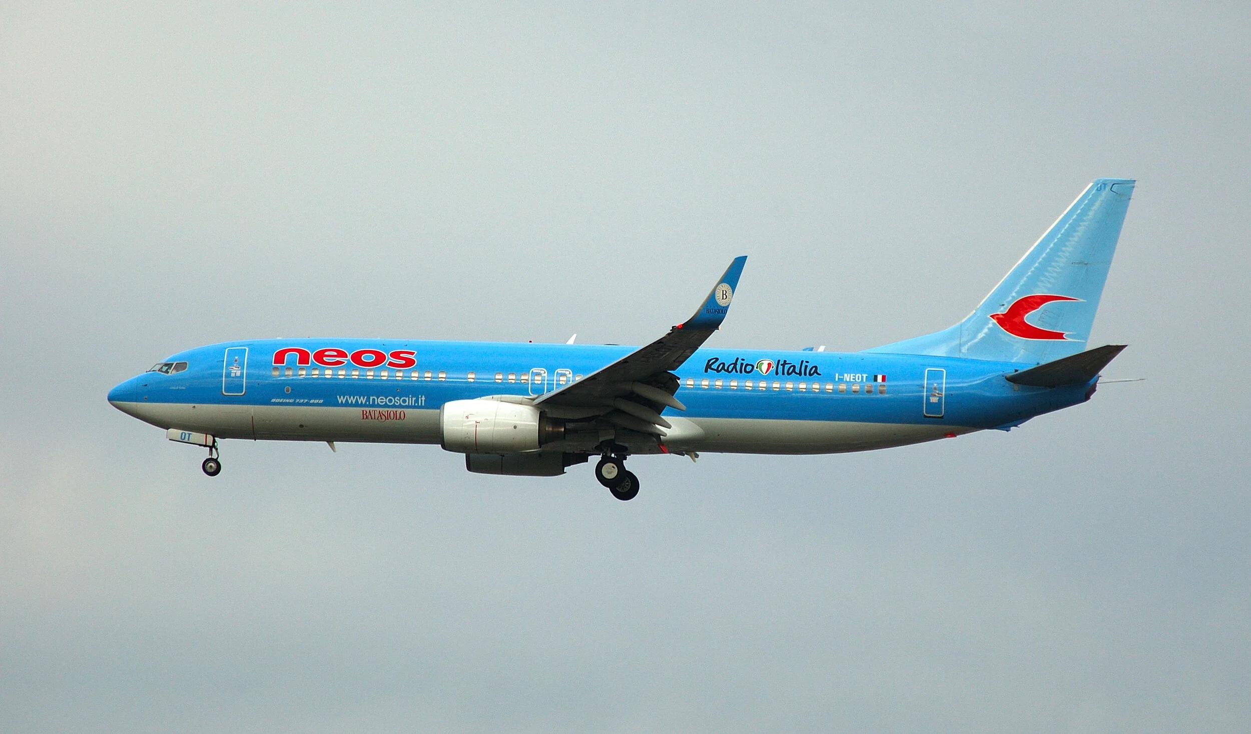 NEOS B737-800 I-NEOT helped to brighten up a very overcast day at Manchester on 22nd October.Photo :Paul Rowland.