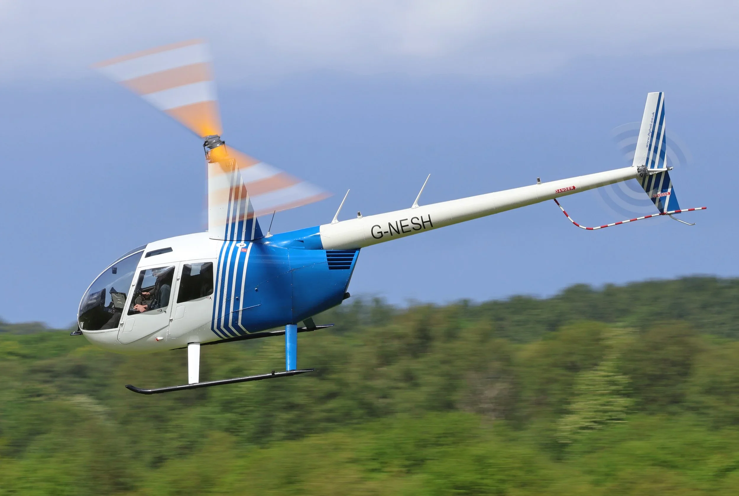 13th May 2026 - Robinson R44 Clipper II G-NESH aka 'Pipeline81' departing Barton was photographed by Simon Edwards.