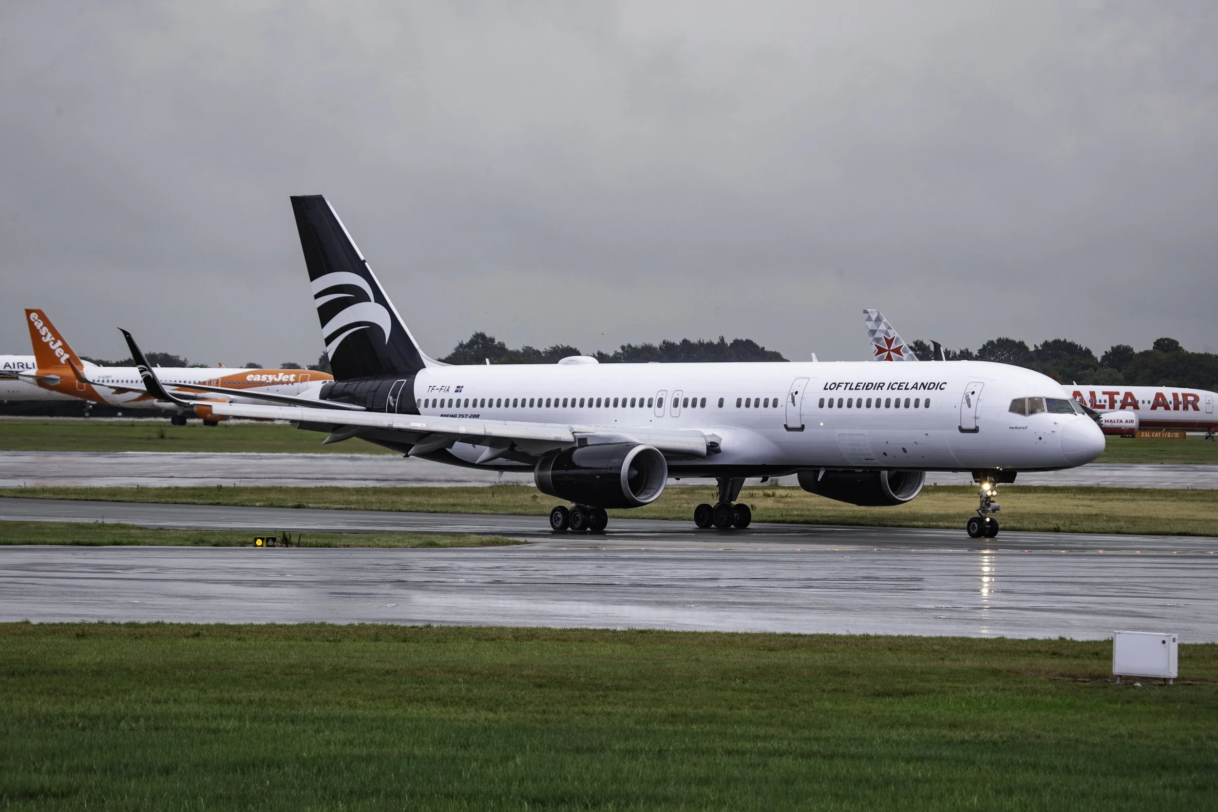 28th August 2026 - Debbie Riley was on commentary duty today and photographed a rarely seen B757-200 - TF-FIA of Icelandair arriving from Keflavik.  You will notice the large number of aircraft waiting for departure from Runway 23L - the reason was a