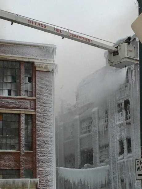 Building covered white after putting out fire