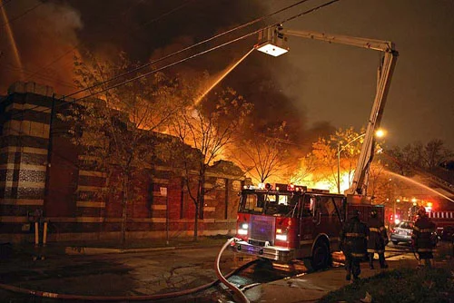Spraying water from above fire