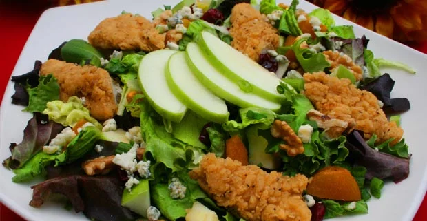 SOUTHERN FRIED CHICKEN SALAD Diced chicken served over crisp greens with tomatoes, cucumber, onion and green peppers
