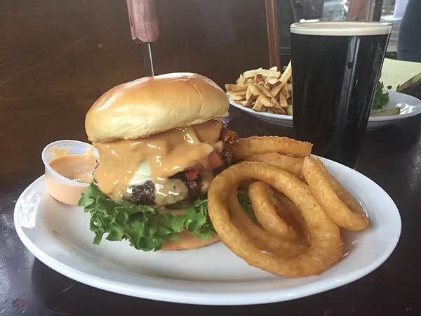 PEANUT CITY STICKY BURGER* Suffolkians favorite ~ 1/2 pound burger topped with bacon and Provolone cheese and a peanut butter spread