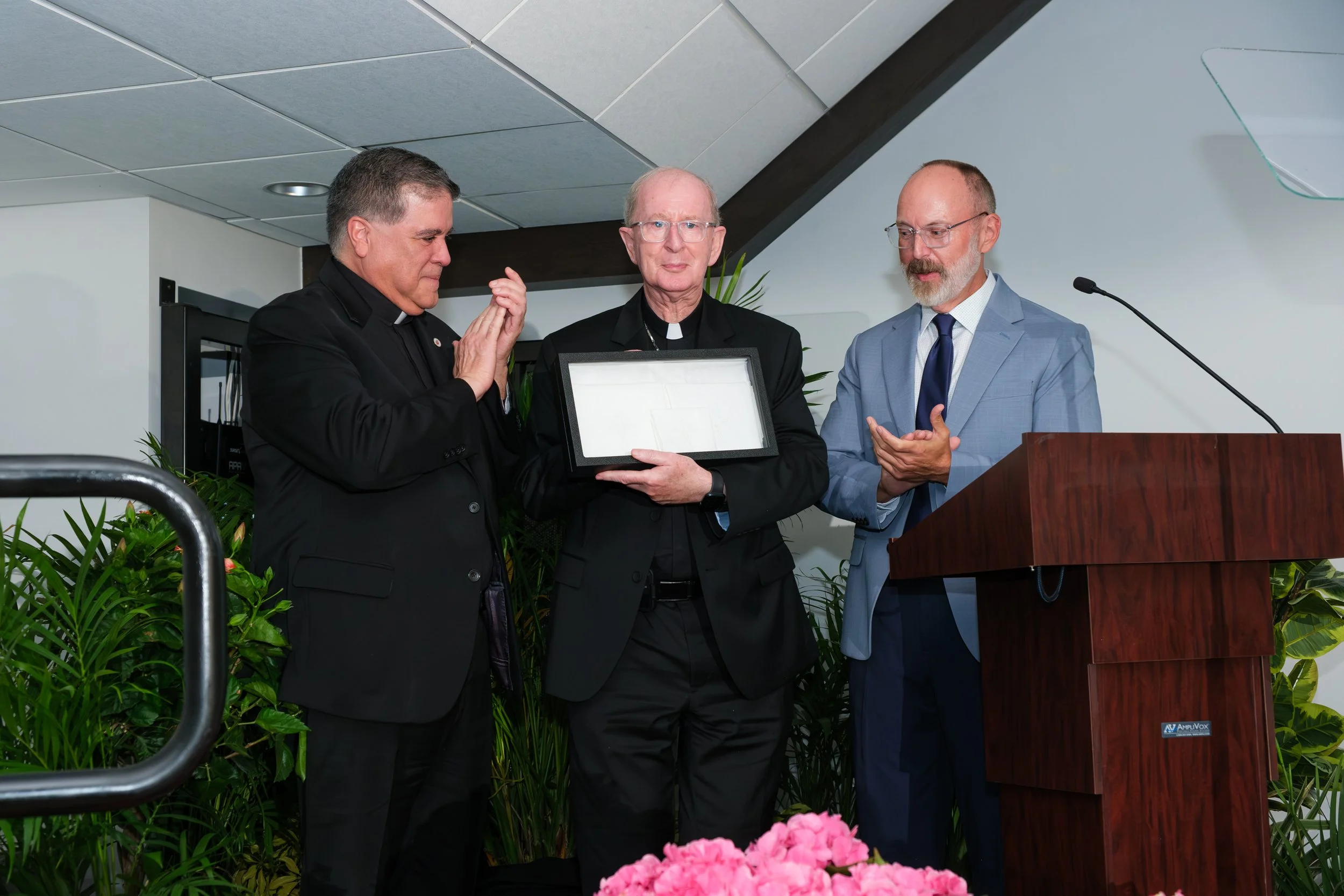Bishop Noonan w Gift of Irish Linen Handmade Altar Cloths.jpg