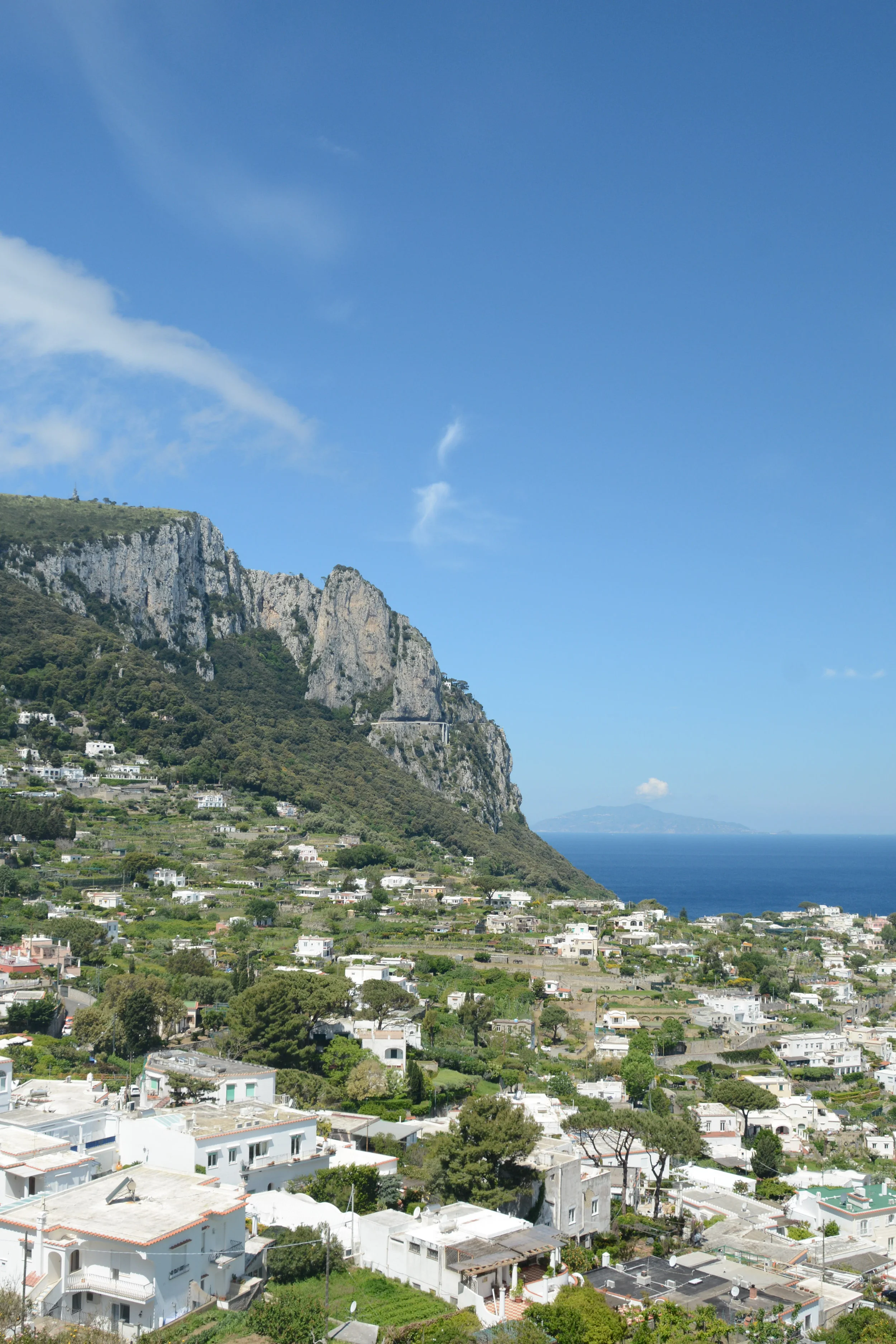 With Vesuvius moldering across the Bay of Naples.