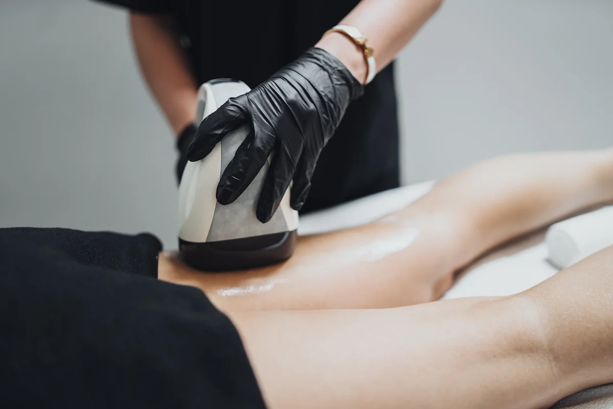 Monika Dixon of Monika Dixon Public Relations tries out the VelaShape treatment at GLAMD in River North.