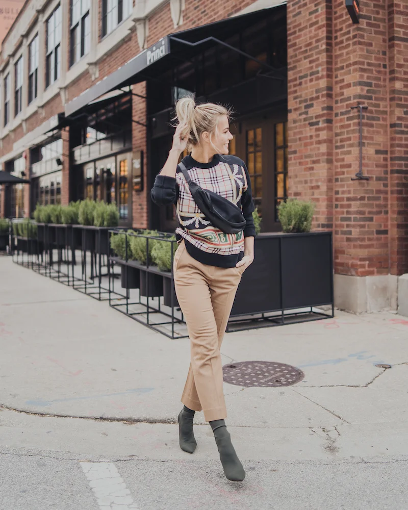 Monika Dixon of Monika Dixon Public Relations wearing rag and bone crop pants, Burberry sweater, and Tony Bianco booties