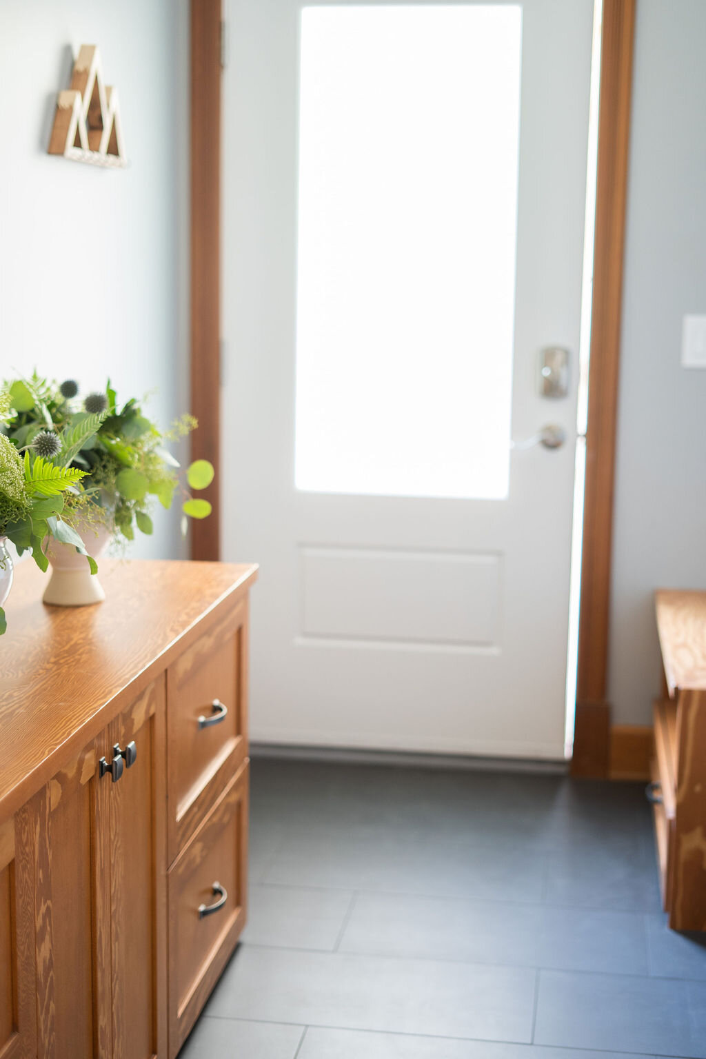 interior-designs-by-adrienne-cranbrook-bc-heated-tile-floors-gray-tile-glass-door