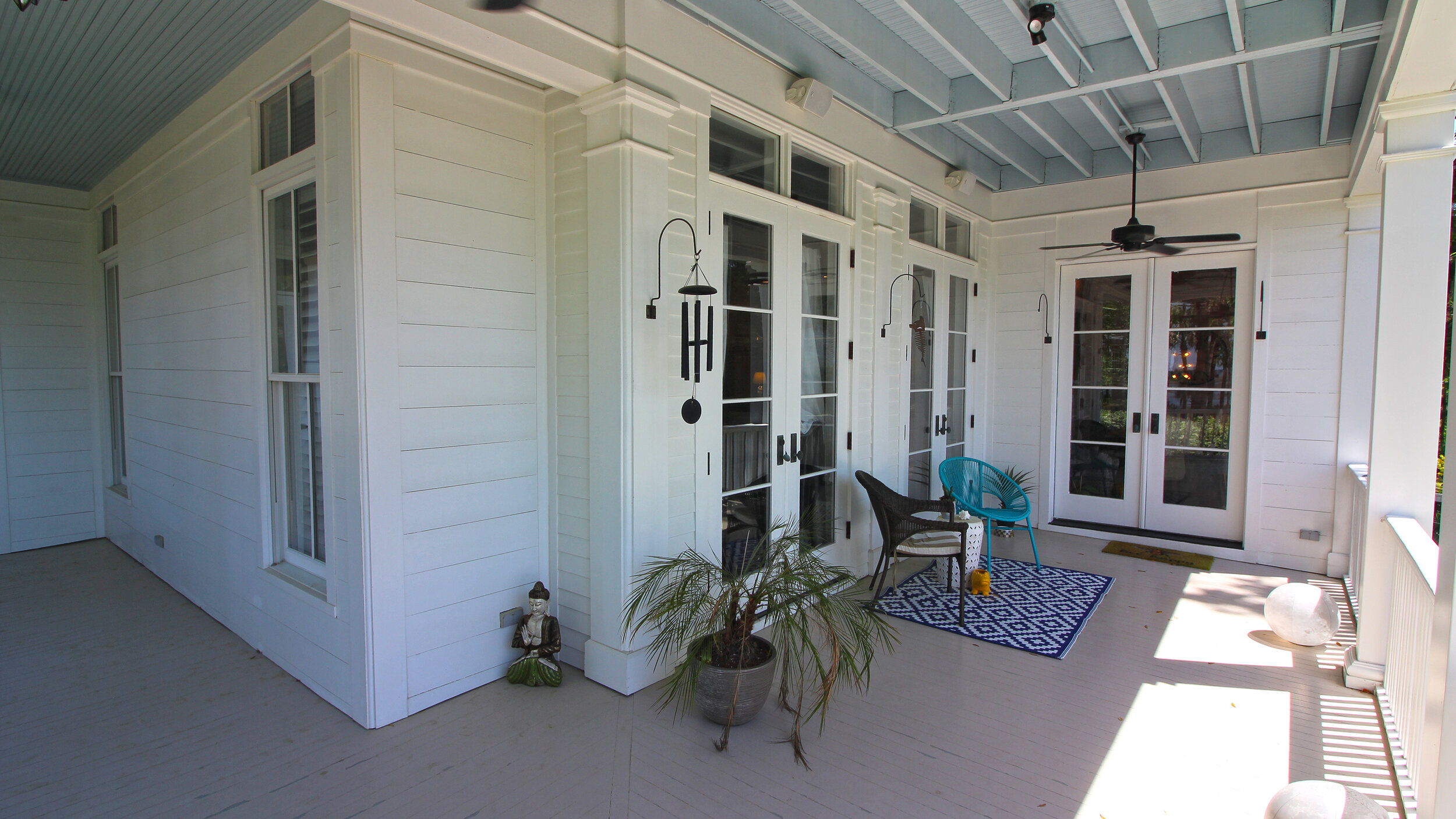  Wrap porch overlooking rear patio and garden 