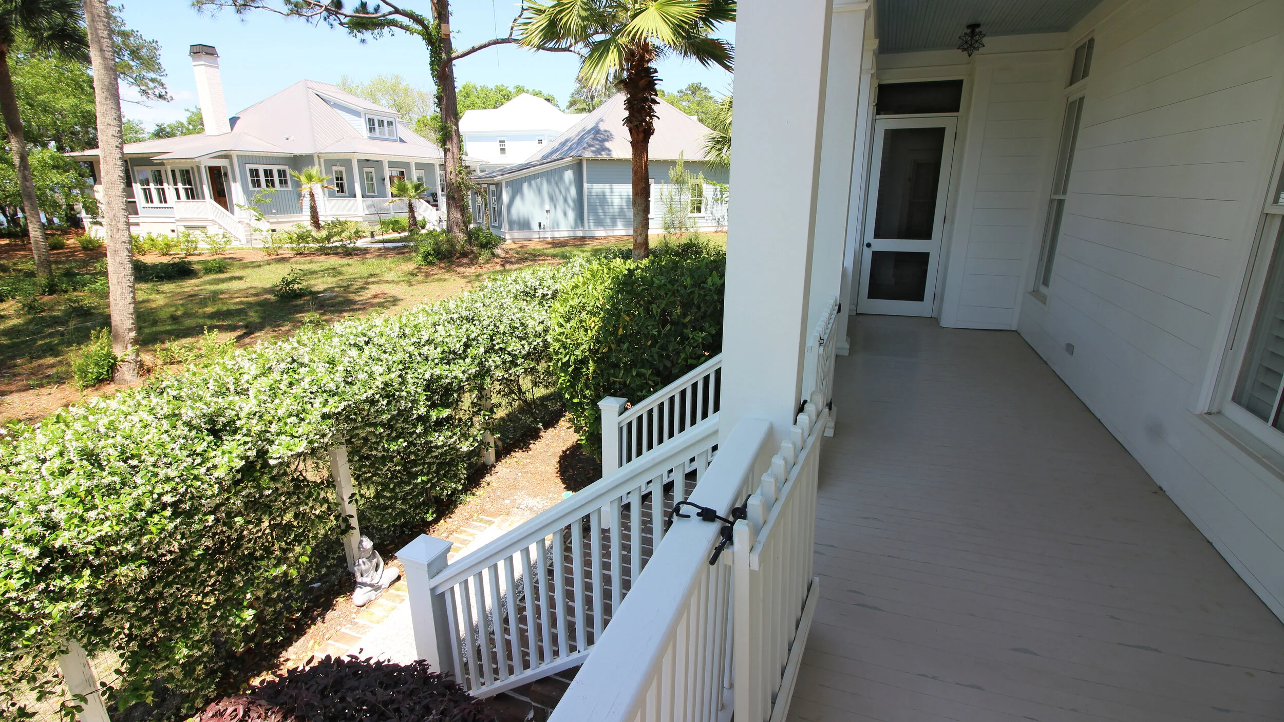  Side entry to wrap porch from marsh-side courtyard 