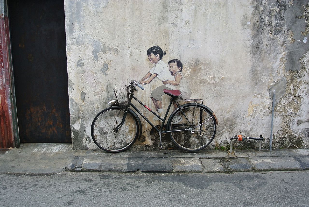 Little children on a bicycle (Armenian Street)