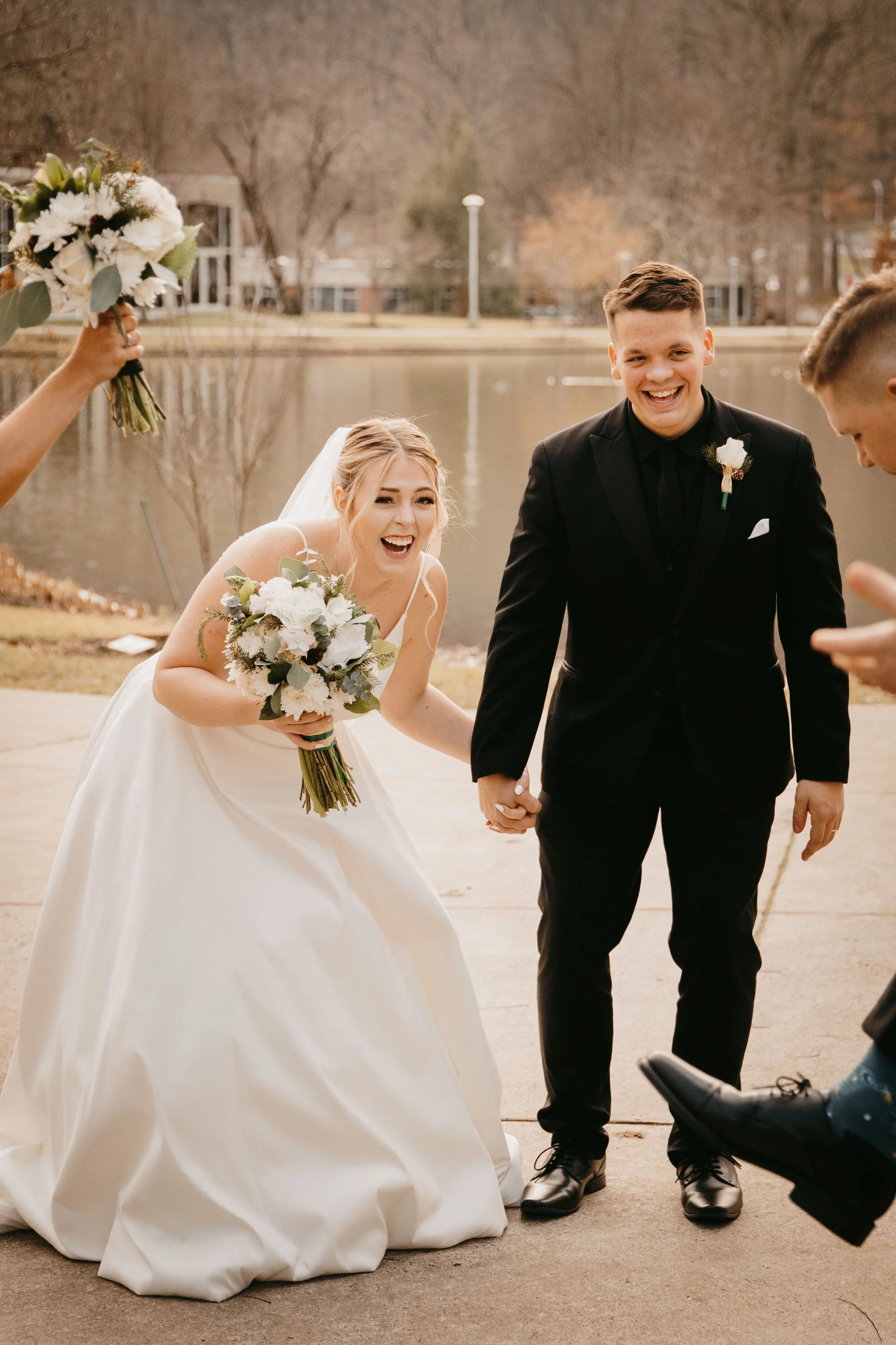      

 
    “Amy captured our day PERFECTLY! She worked with our crazy schedule to schedule our engagement shoot and instantly knew how to make us comfortable in front of the camera. Then she found a way to make us relive every magical moment of our