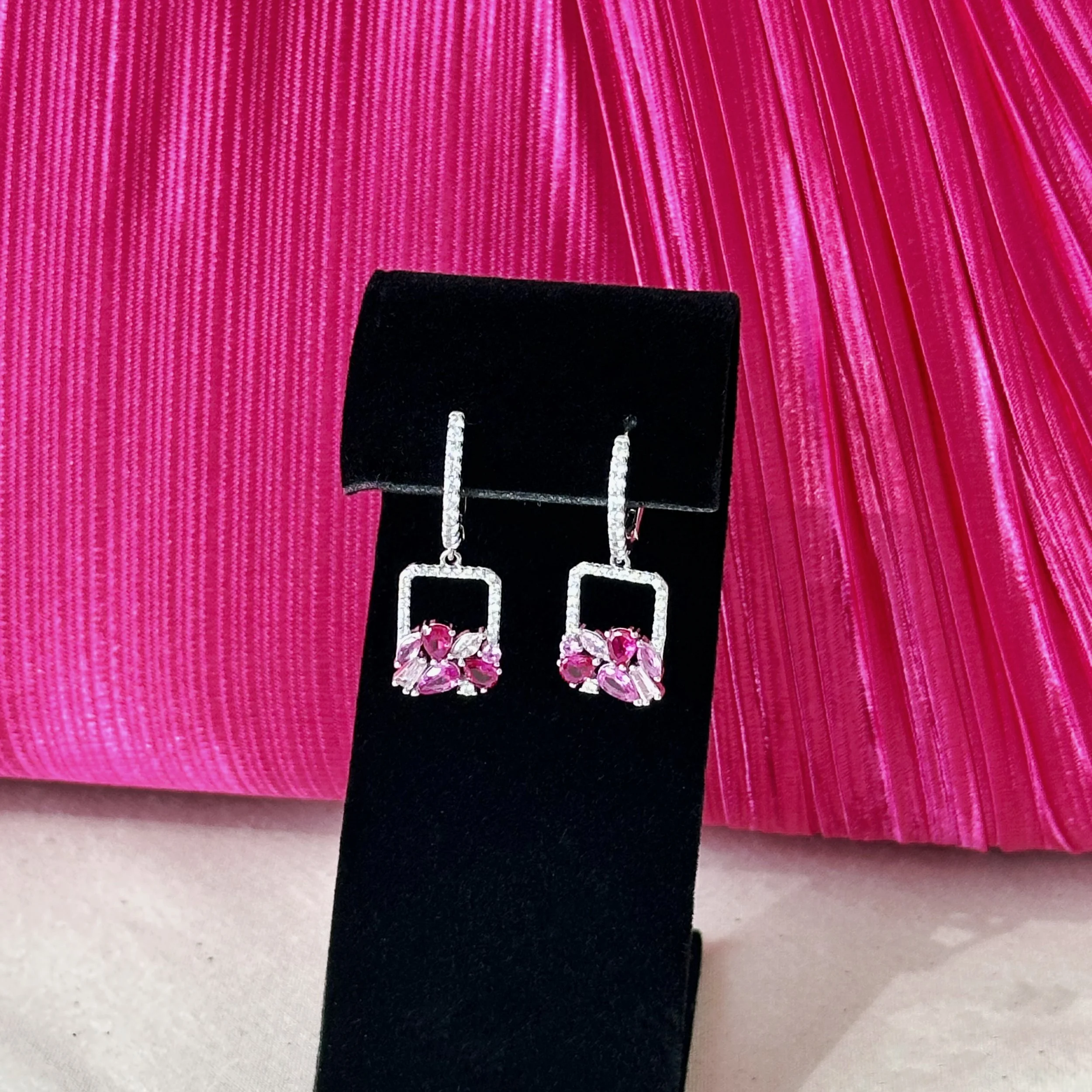 A little pink can do a lot for a look ✨

One of one sterling silver cuff earrings, finished with uniquely crafted cubic zirconia stones and paired with a jeweled clutch to bring an elegant and bold look together. 

Styled well with a black dress, all