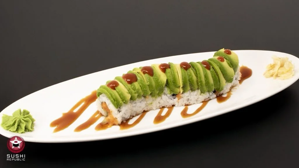 Turn up the heat with the Mad Salmon Roll 🍣🌶️

Spicy salmon + jalape&ntilde;o bring the kick, cucumber keeps it crisp, and that avocado on top? Smooth perfection. Finished with sriracha dots and a rich eel sauce drizzle for the ultimate flavor comb